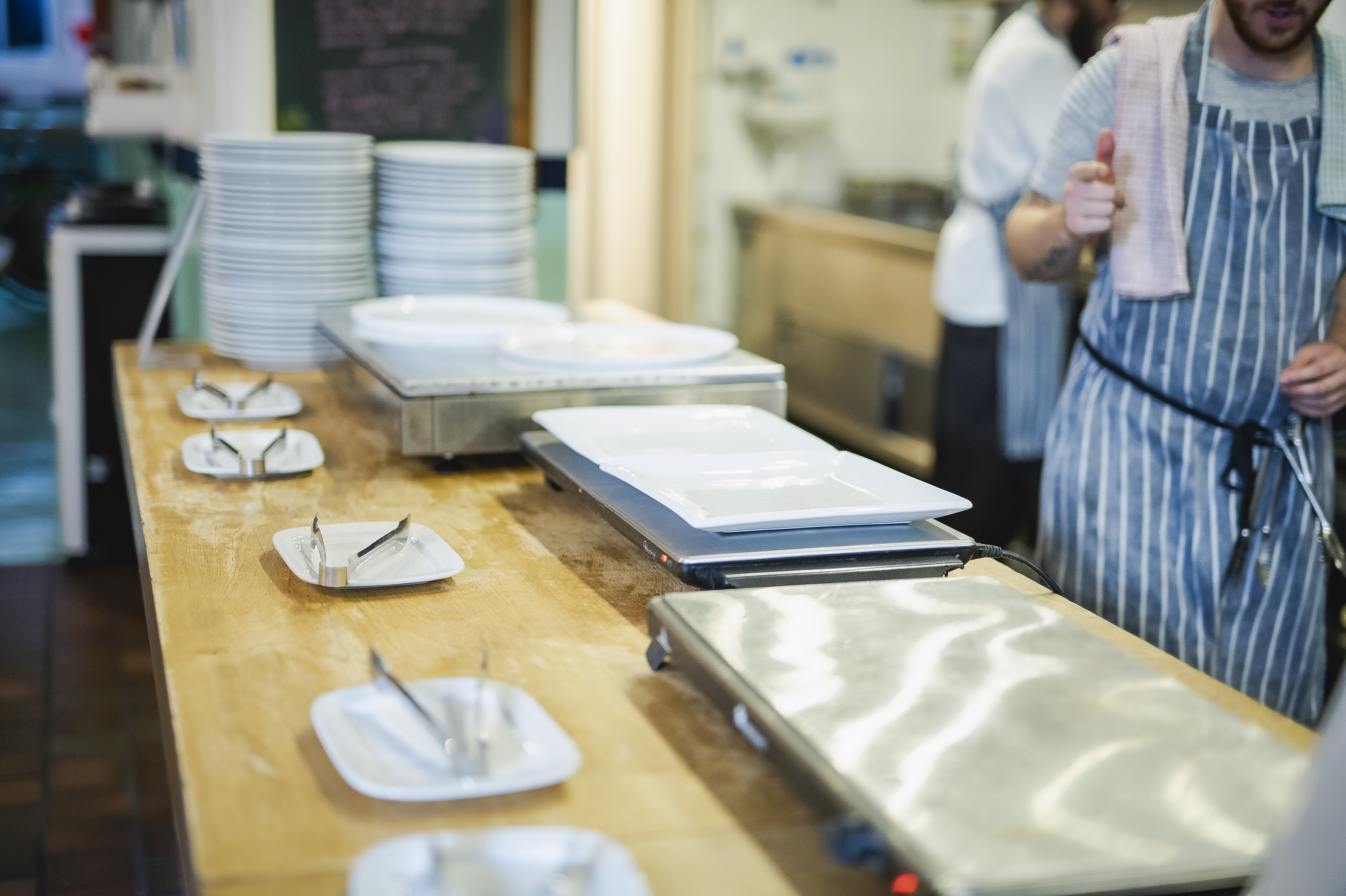 Catering setup at Covent Garden Kitchen, showcasing organized plates for events.