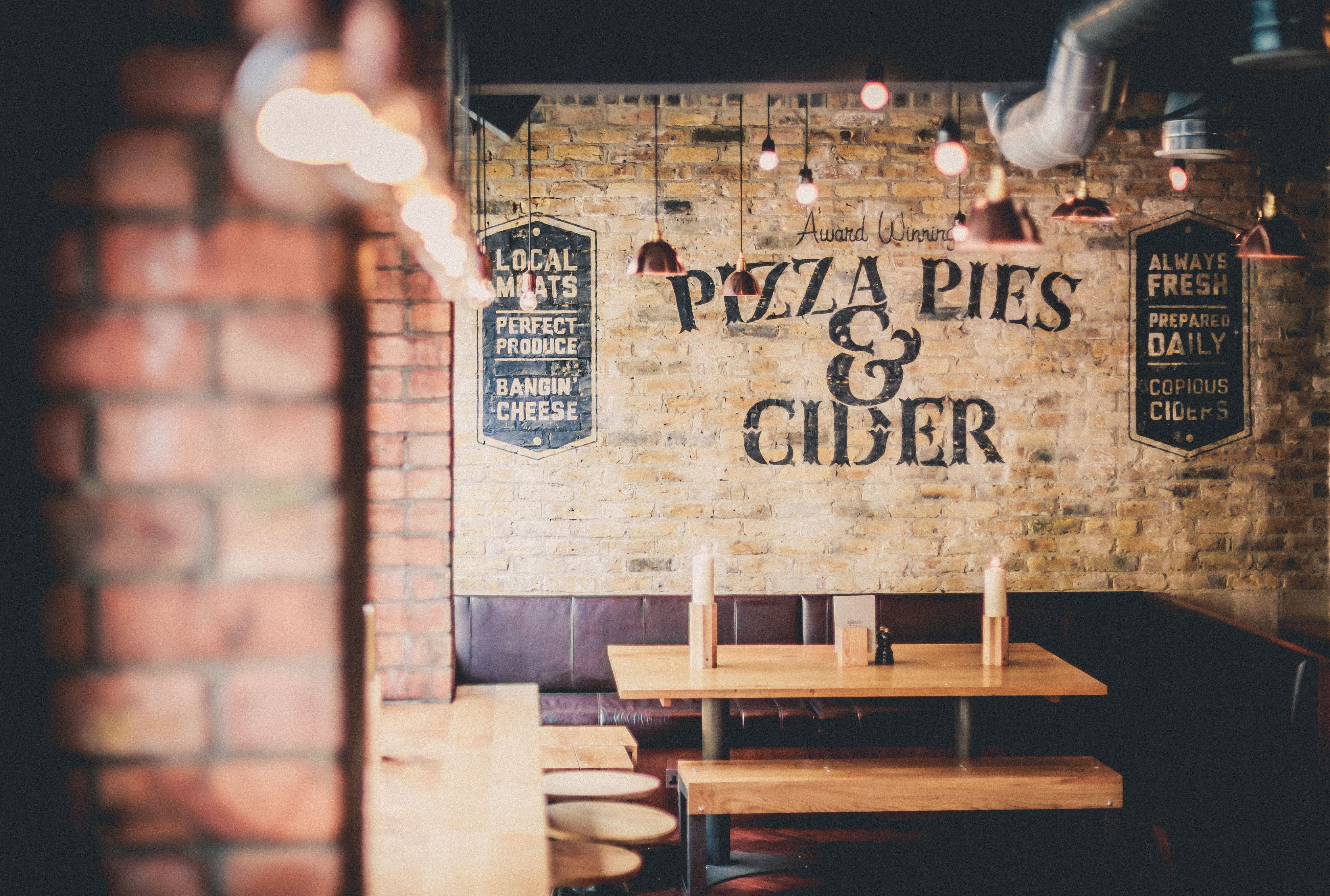 Cozy rustic dining space for informal meetings at The Bath Stable, ideal for team gatherings.