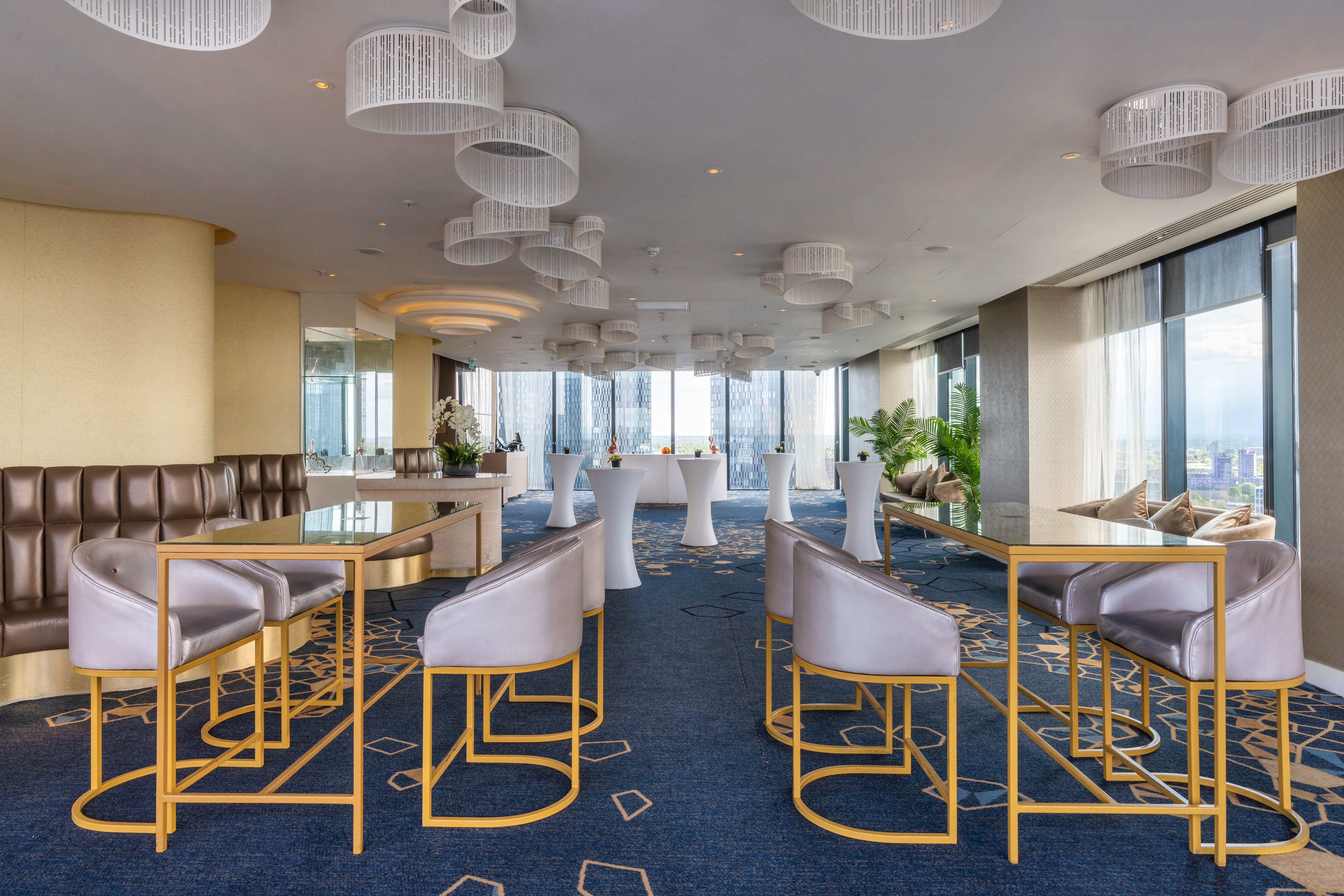 Iris Lounge at Cloud 23: elegant event space with modern decor for cocktail receptions.