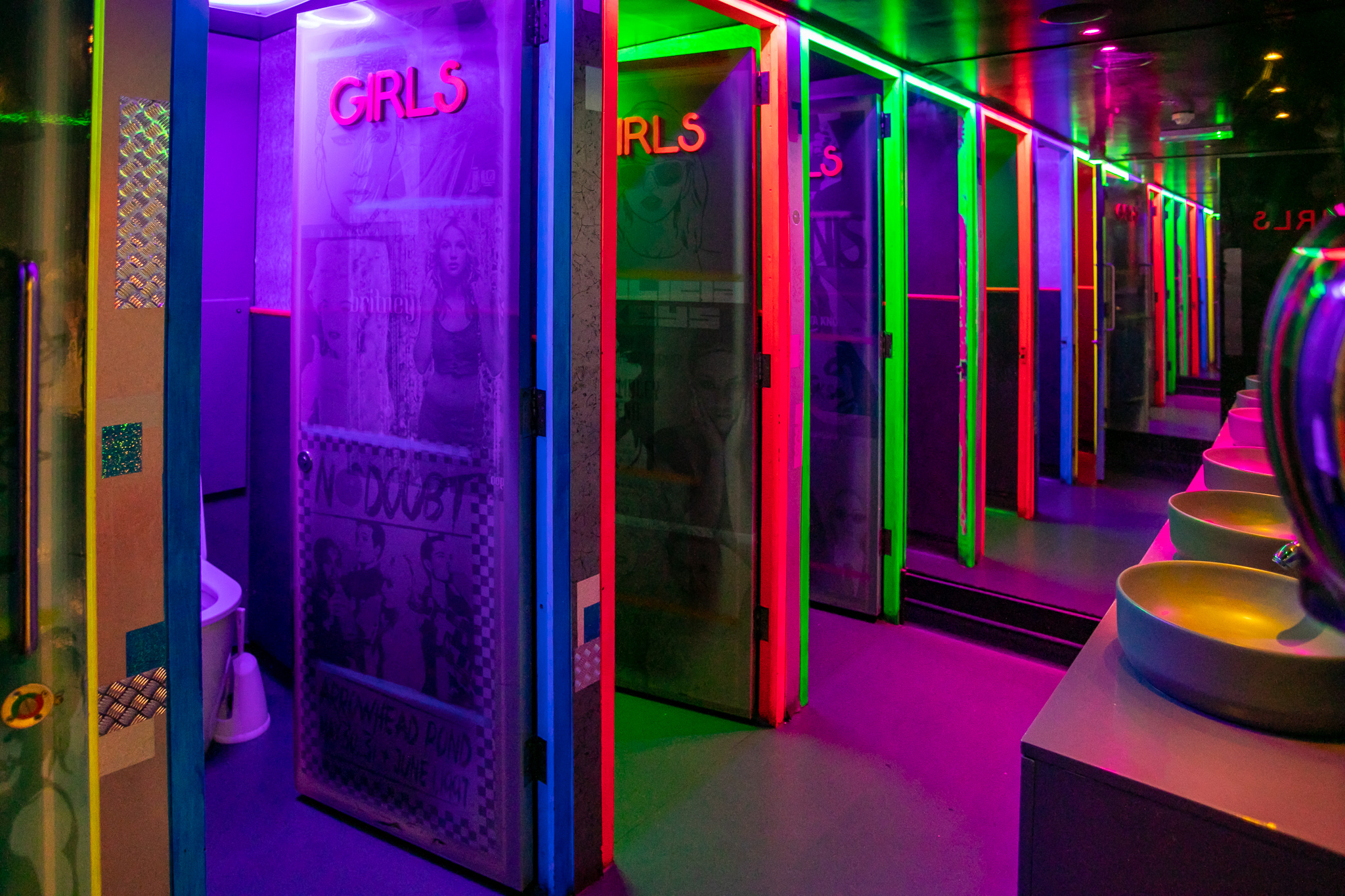 Vibrant private karaoke room with neon lights for events at Lucky Voice Soho.