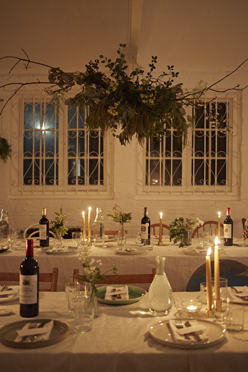 Elegant dining table with candlelight at Kemble House Studio for intimate events.