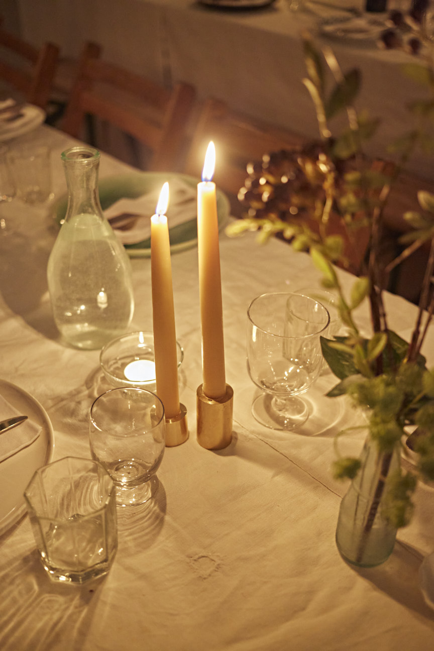 Elegant dining table with candles at Kemble House Studio for intimate events.