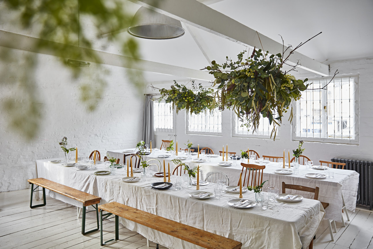 Kemble House Studio event space with elegant greenery and flexible seating for gatherings.