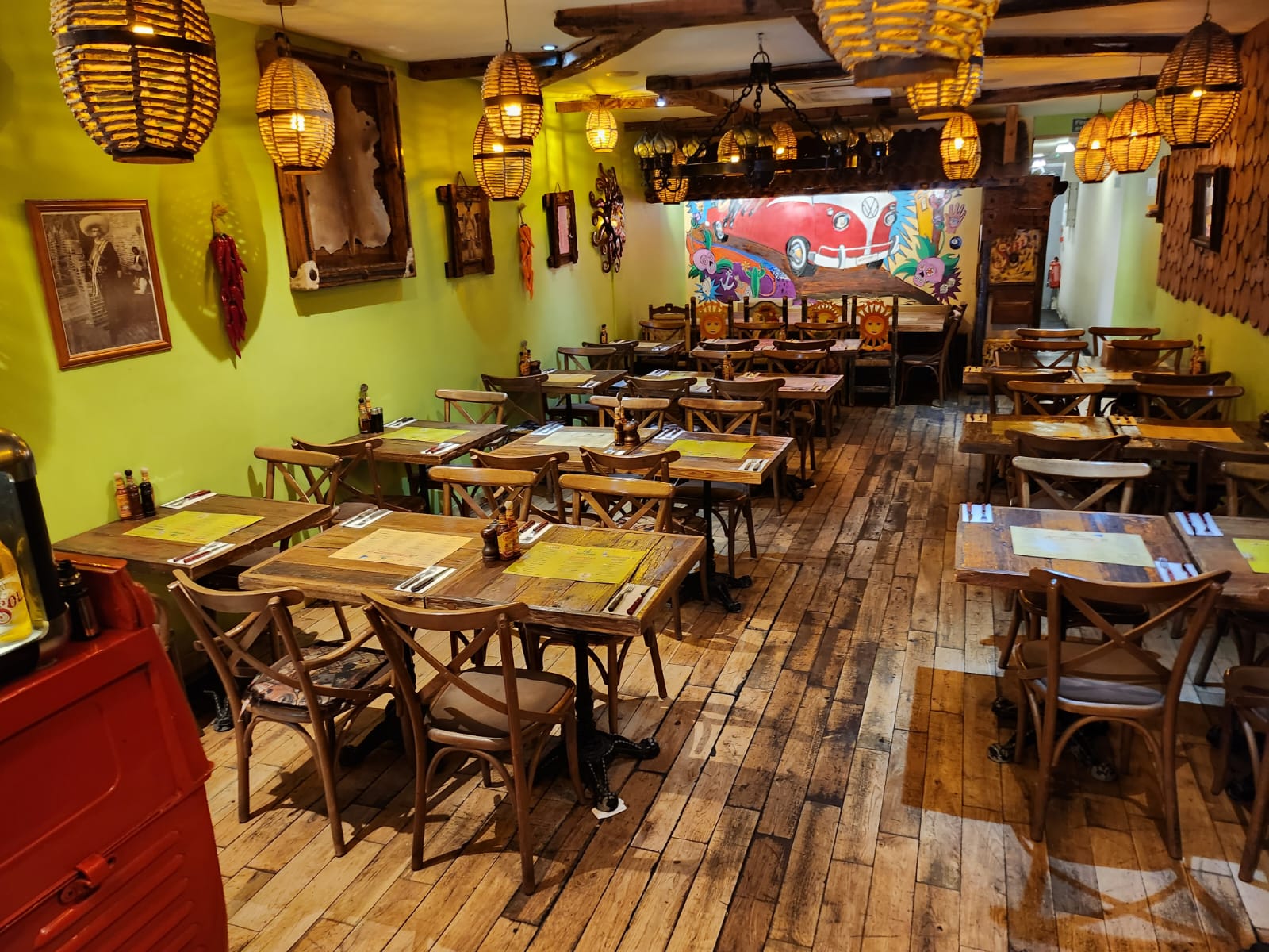 VW Bar Area in Desperados: cozy dining space with rustic tables for intimate gatherings.