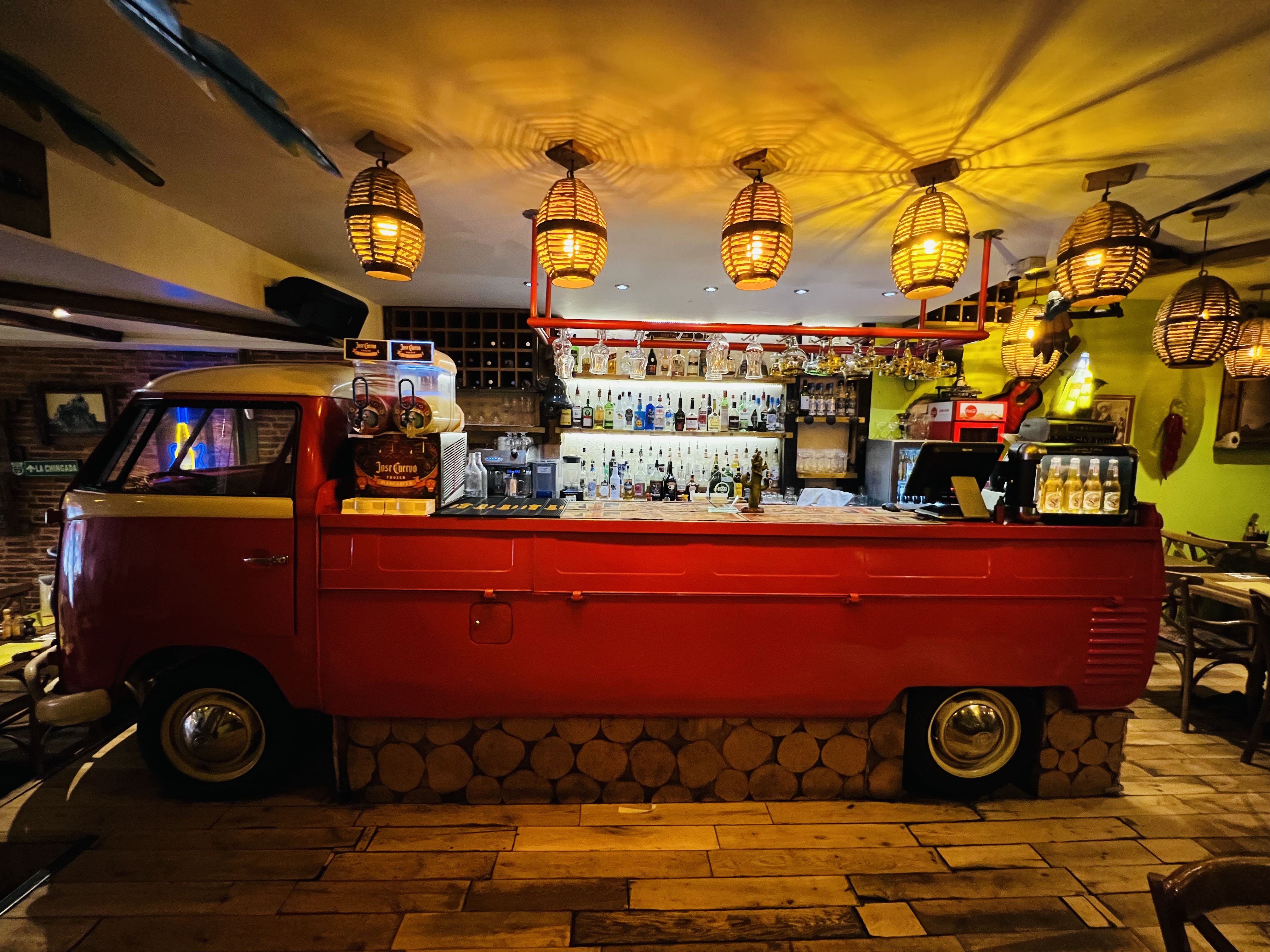 VW Bar Area in Desperados with retro red truck, ideal for events and celebrations.