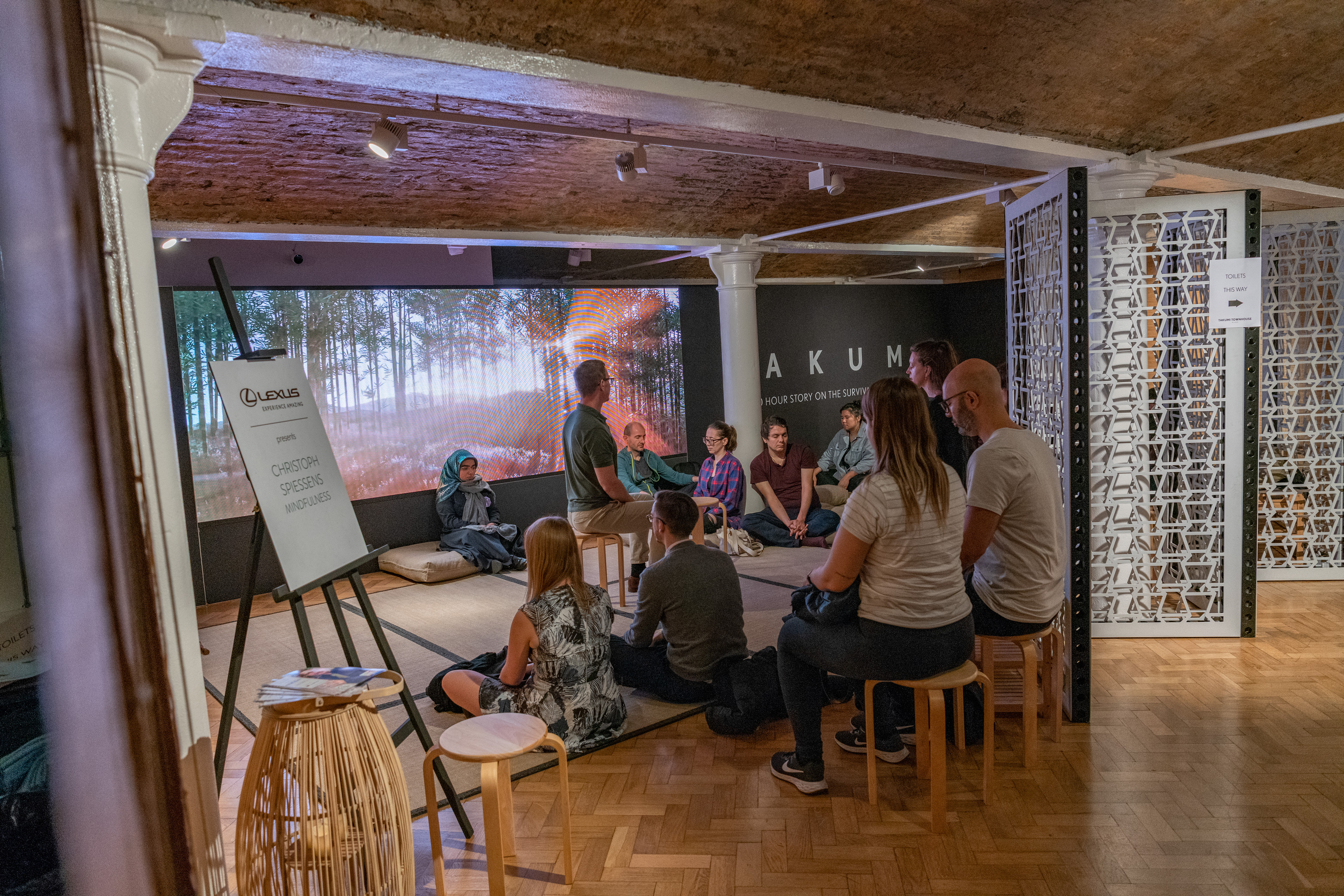 Intimate workshop in The Stables' Lower Gallery with natural lighting and collaborative seating.
