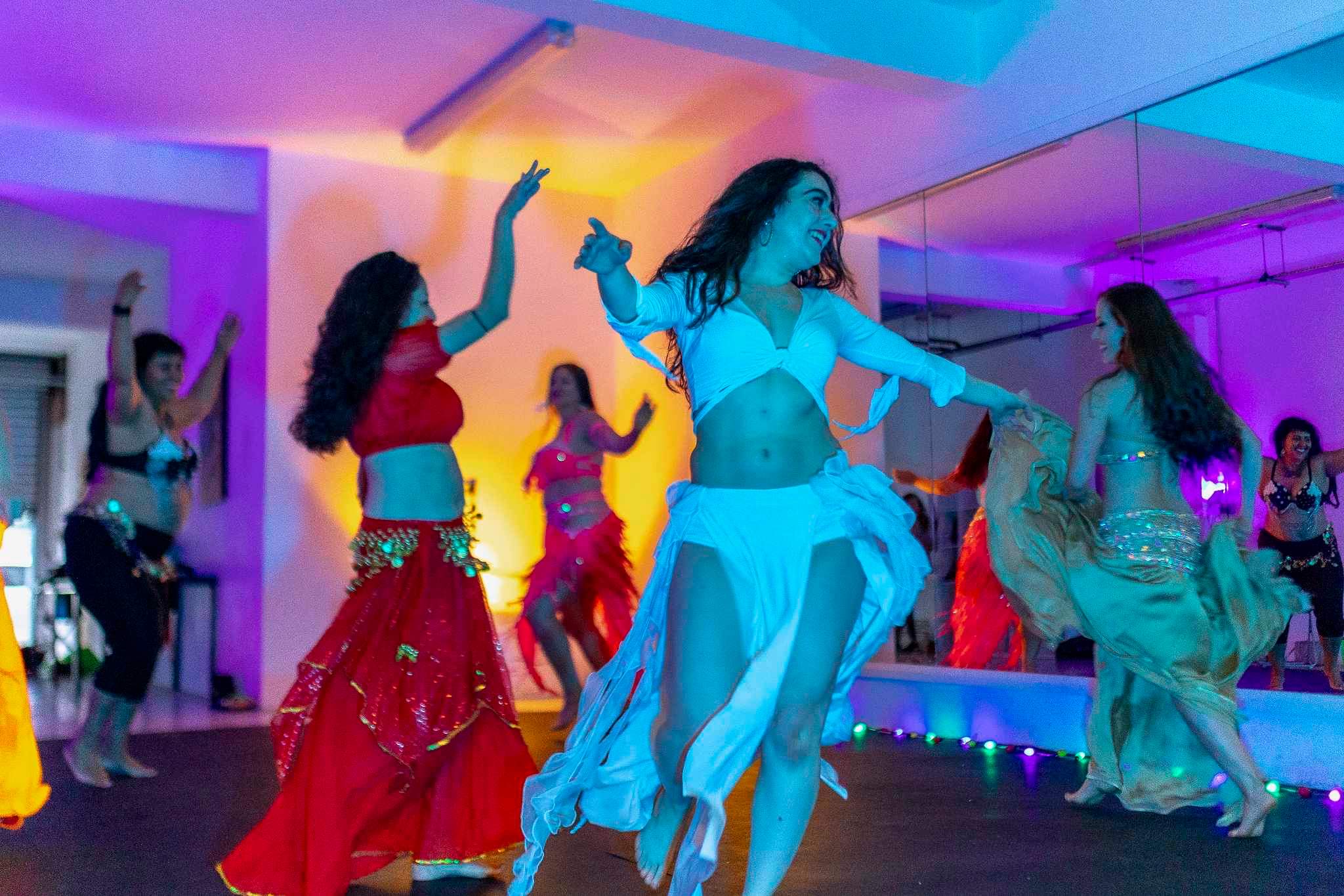 Vibrant dance performance at Jump Studios Bristol with colorful costumes for events.