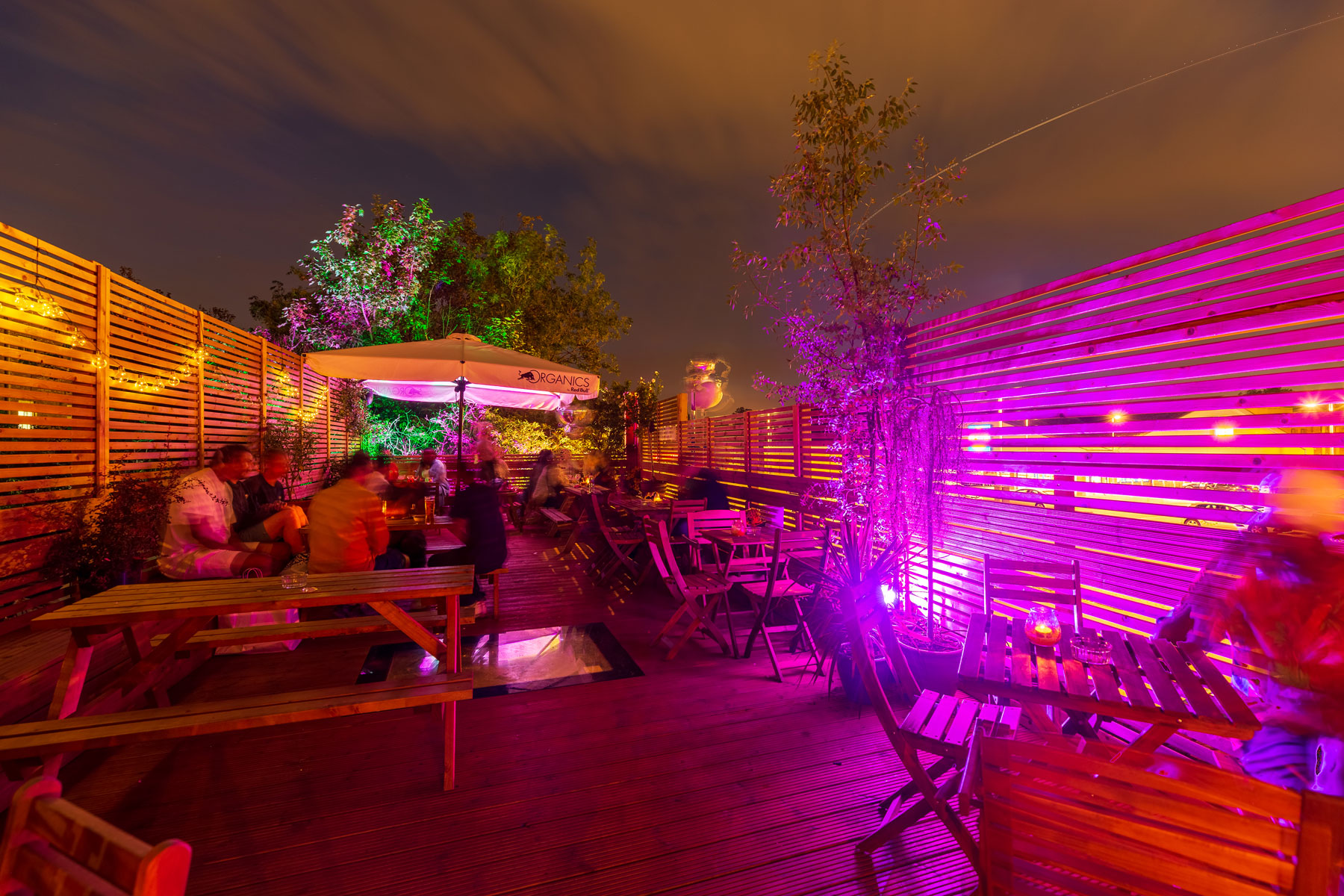 Vibrant TOLA Main Room rooftop venue for casual networking and social gatherings.