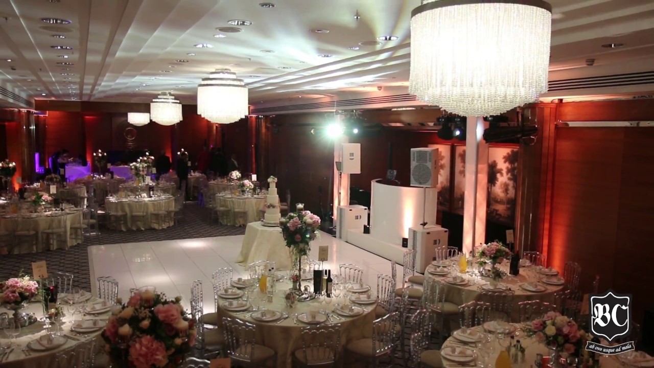 Elegant ballroom at Four Seasons London, perfect for weddings and galas with floral decor.