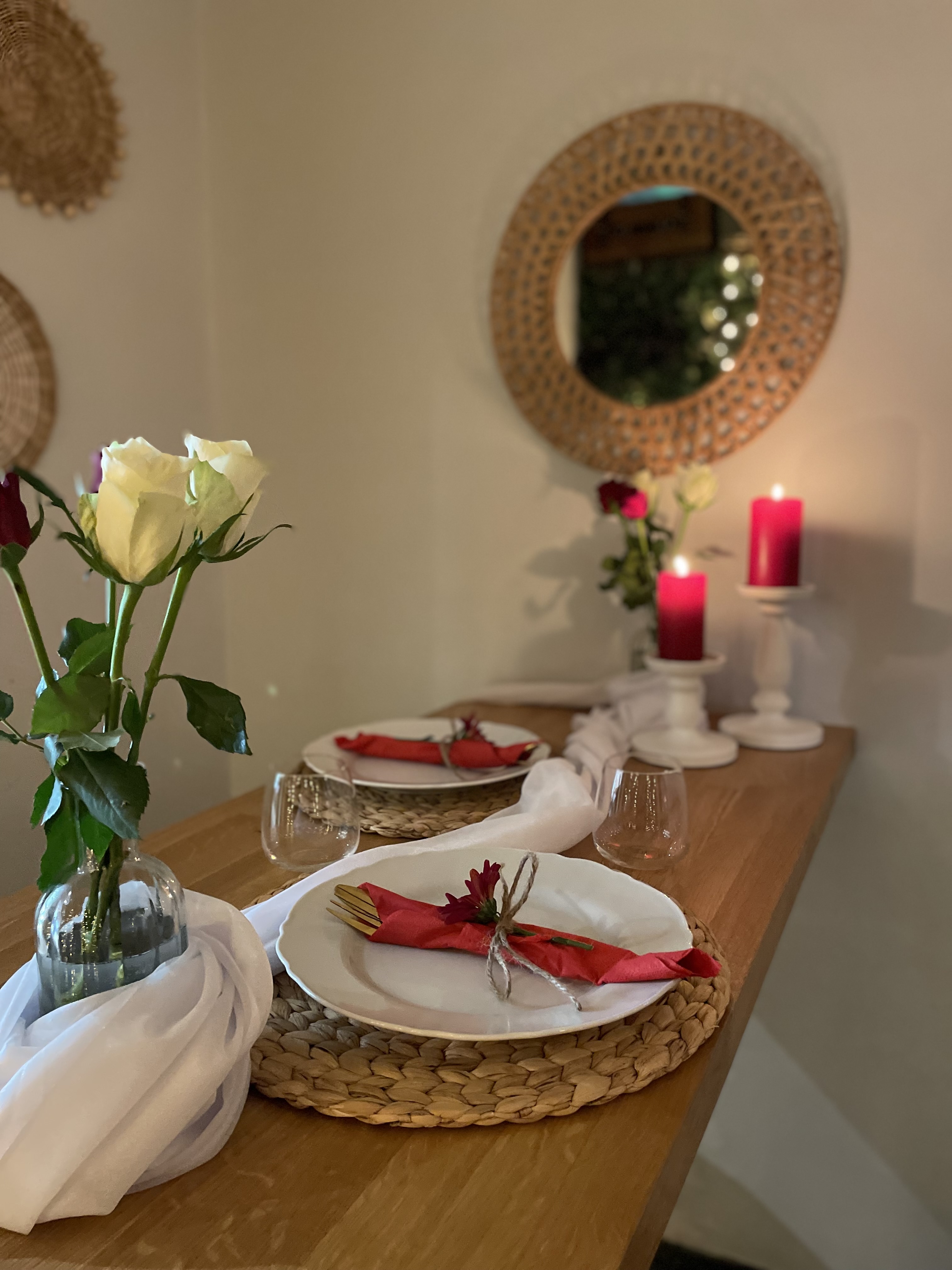 Elegant table setting with roses for a romantic dinner at The Luxury Picnic Cafe.