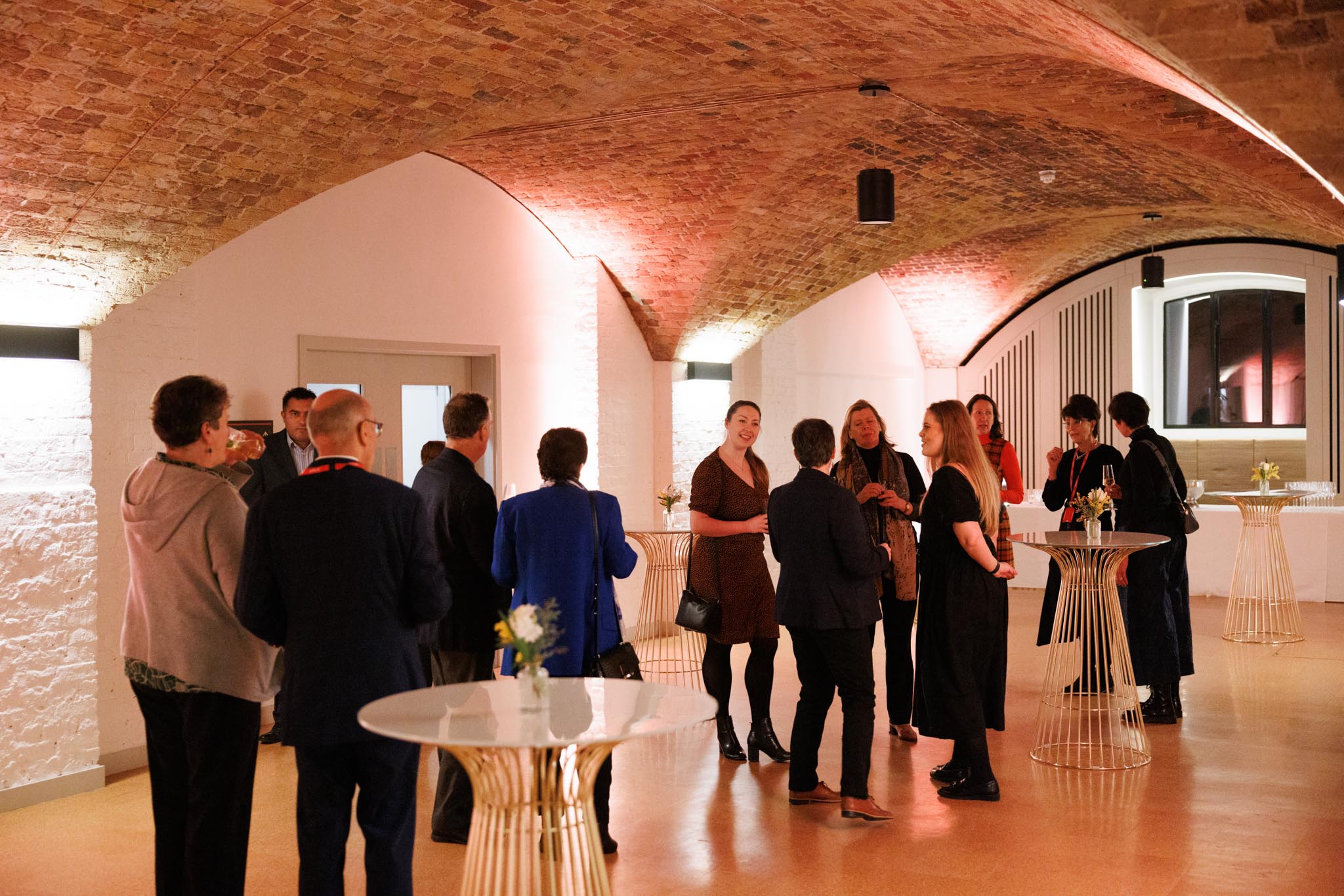 Elegant event space with arched ceilings for corporate gatherings and social events.