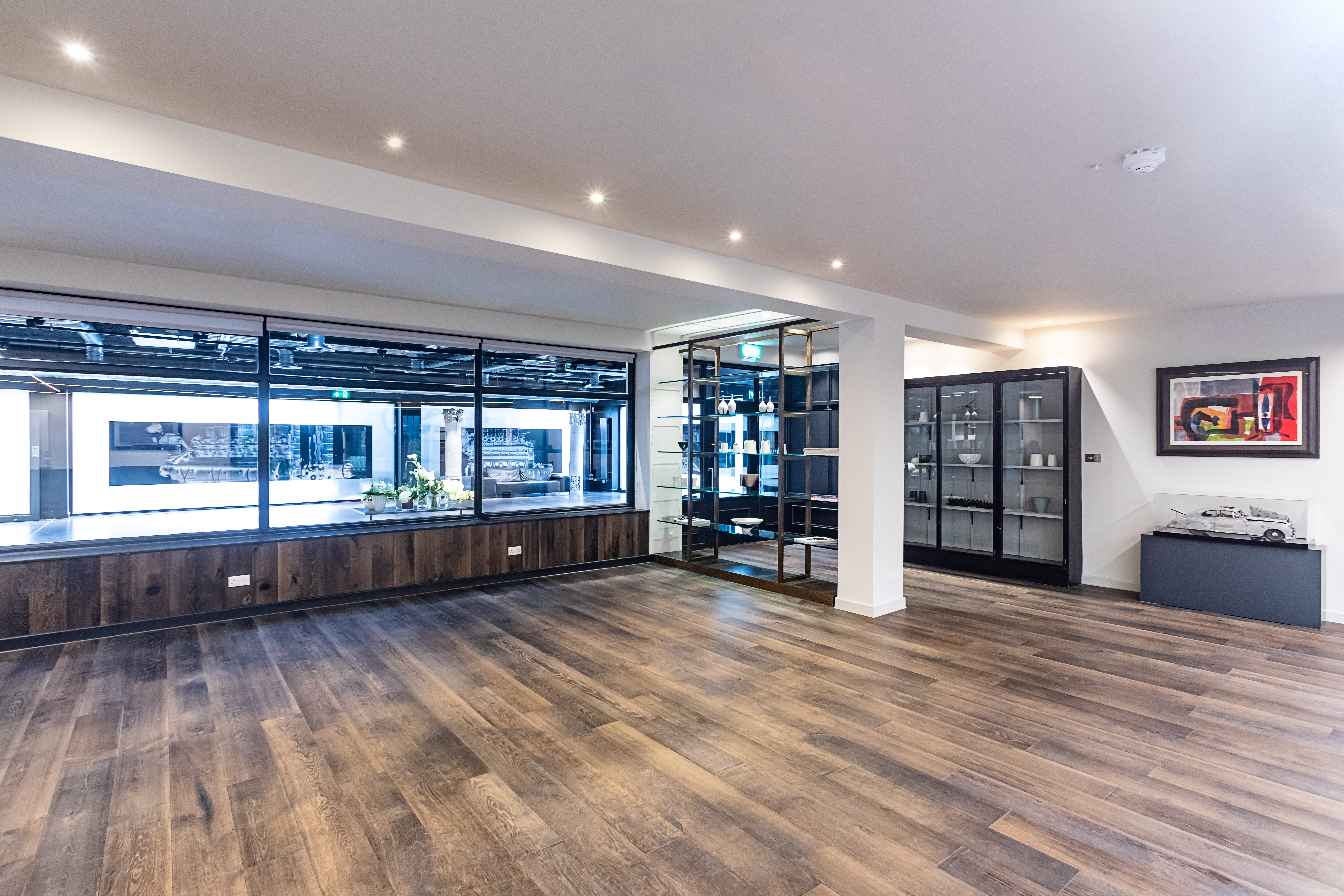 Versatile event space with natural light, ideal for corporate meetings and social gatherings.