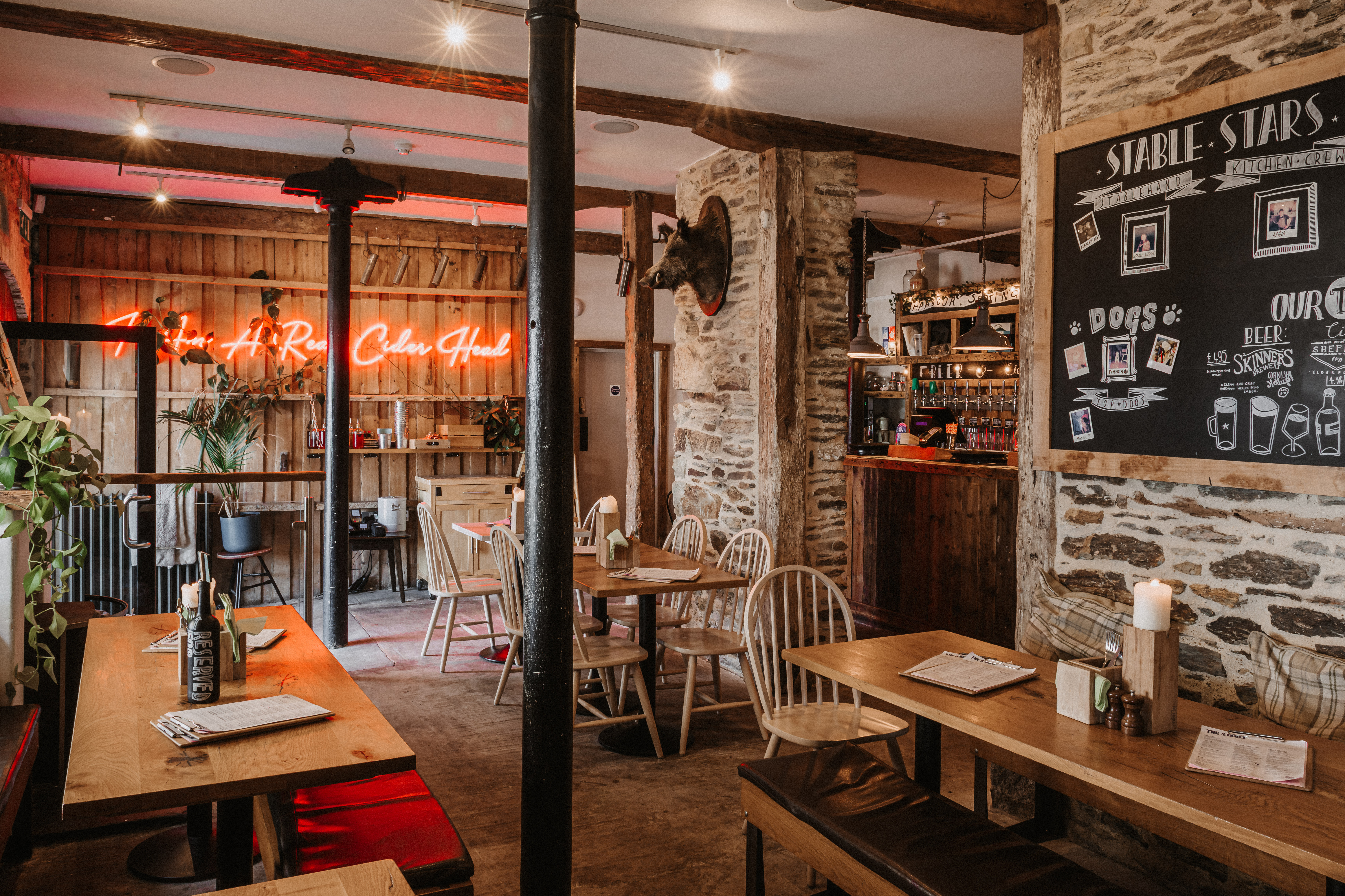 Cozy rustic venue hire at The Falmouth Stable for intimate gatherings and events.