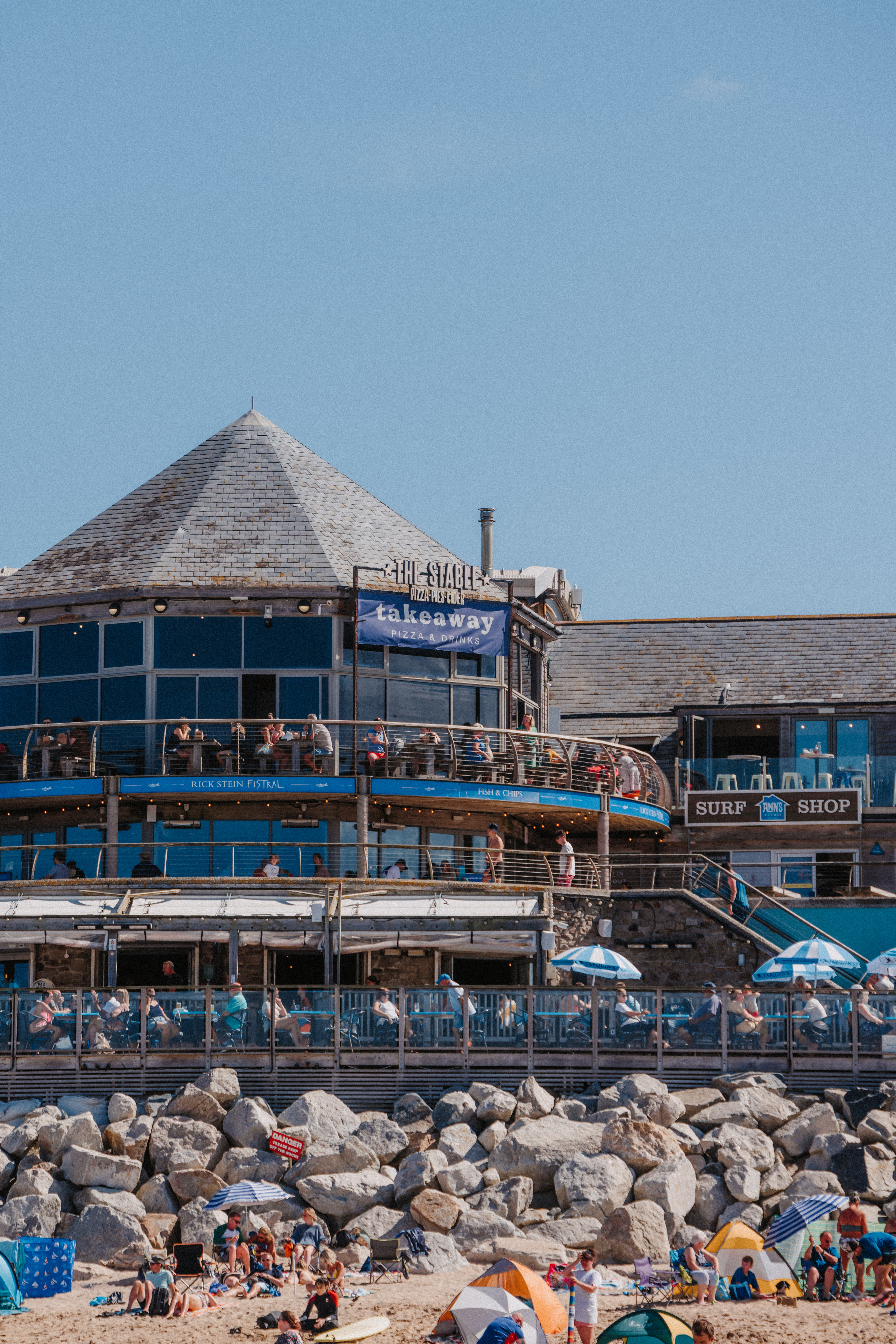 Vibrant waterfront venue with balcony for outdoor events and gatherings in Fistral Stable.