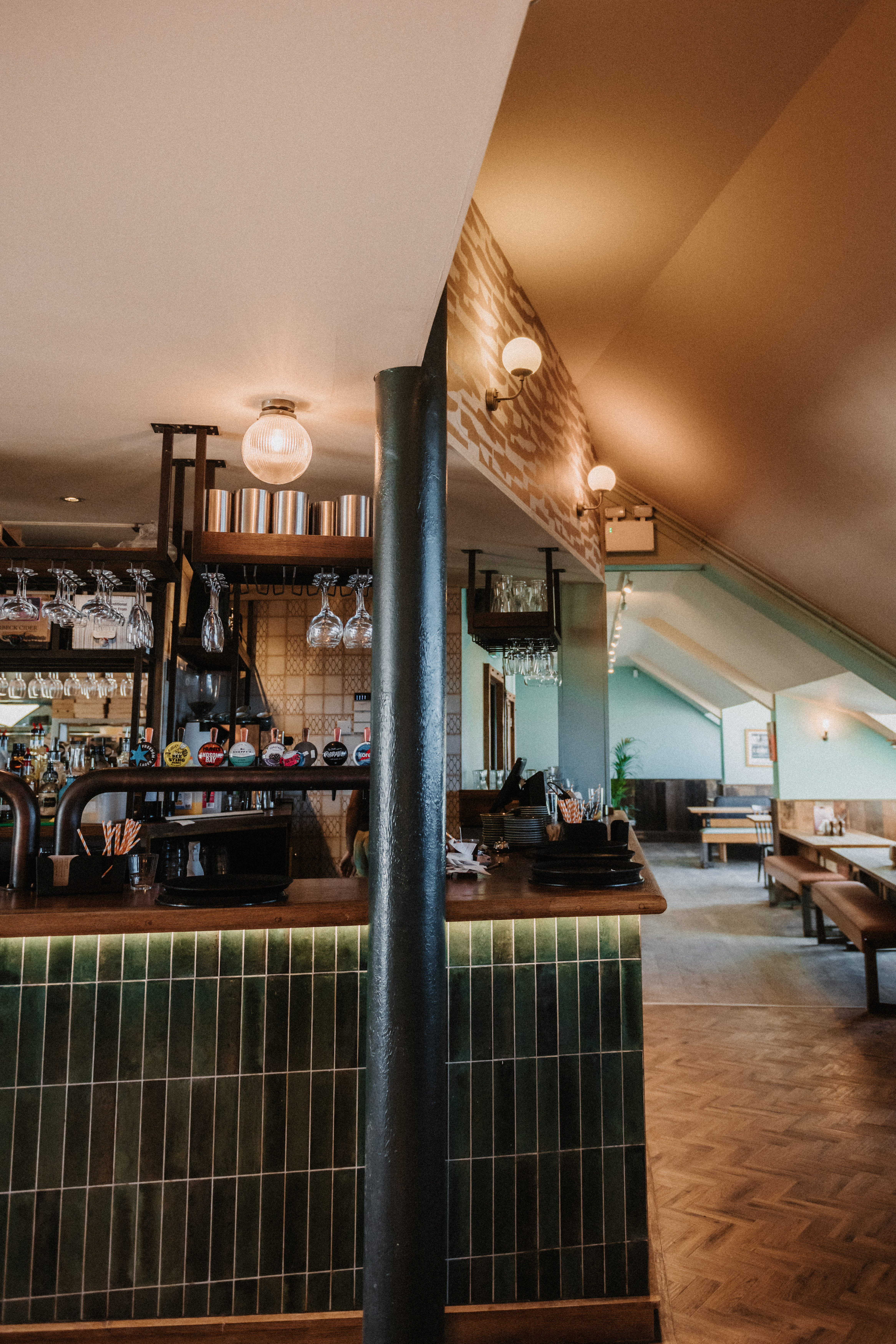 Stylish bar area in The Fistral Stable for informal meetings and networking events.