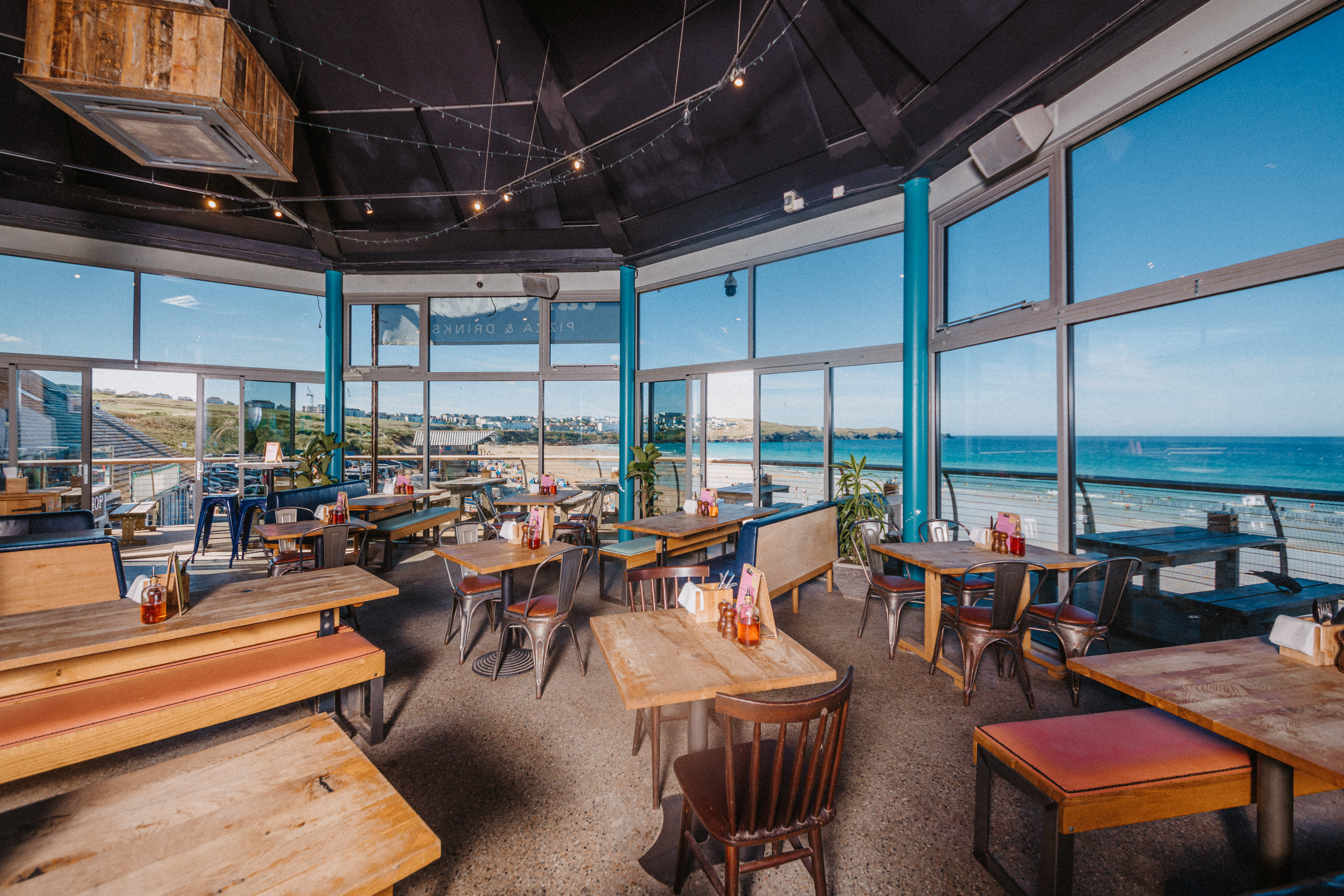 Vibrant event space with ocean views, ideal for meetings and gatherings at Fistral Stable.