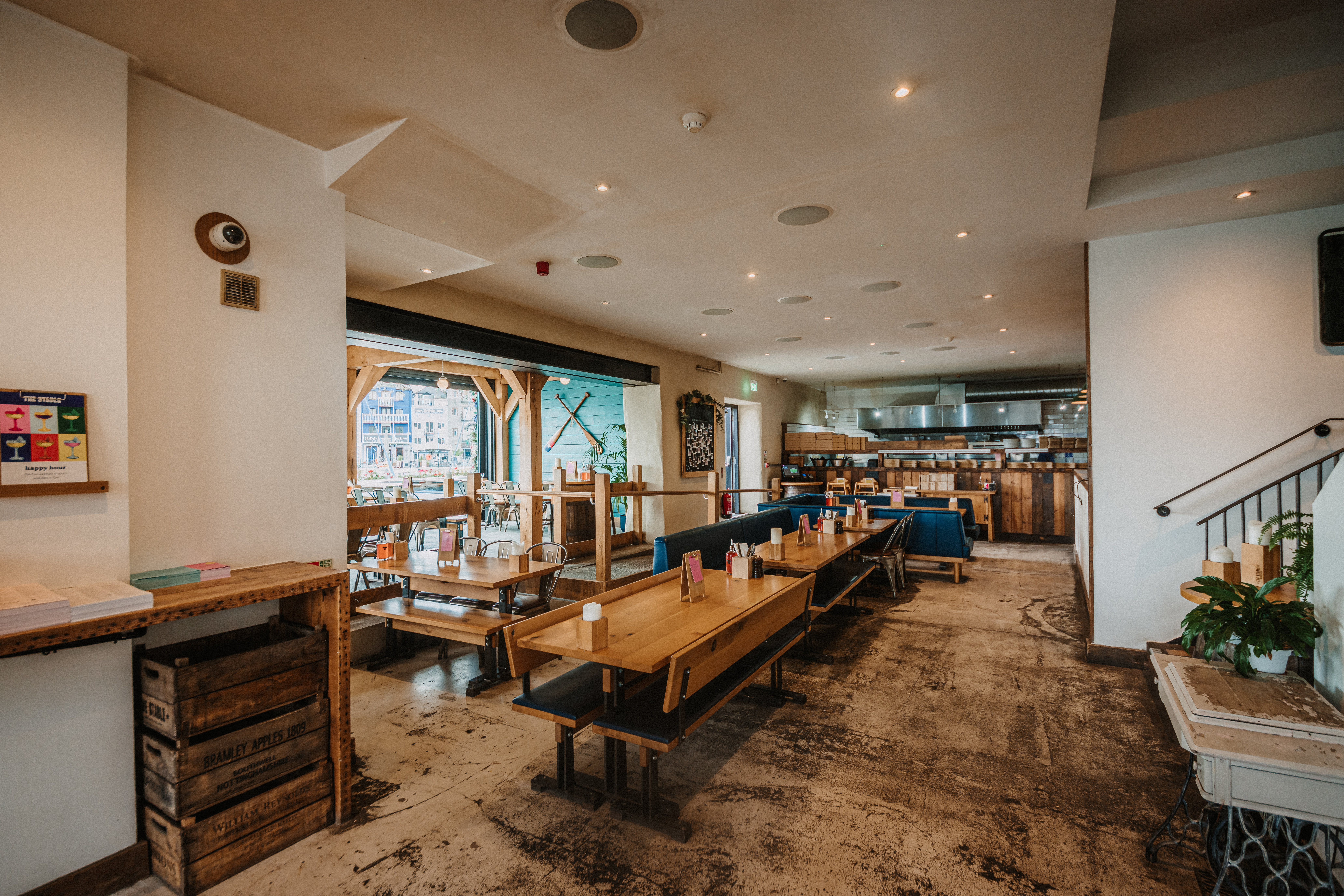 Full Venue Hire at The Plymouth Stable, modern space for events with ample seating.