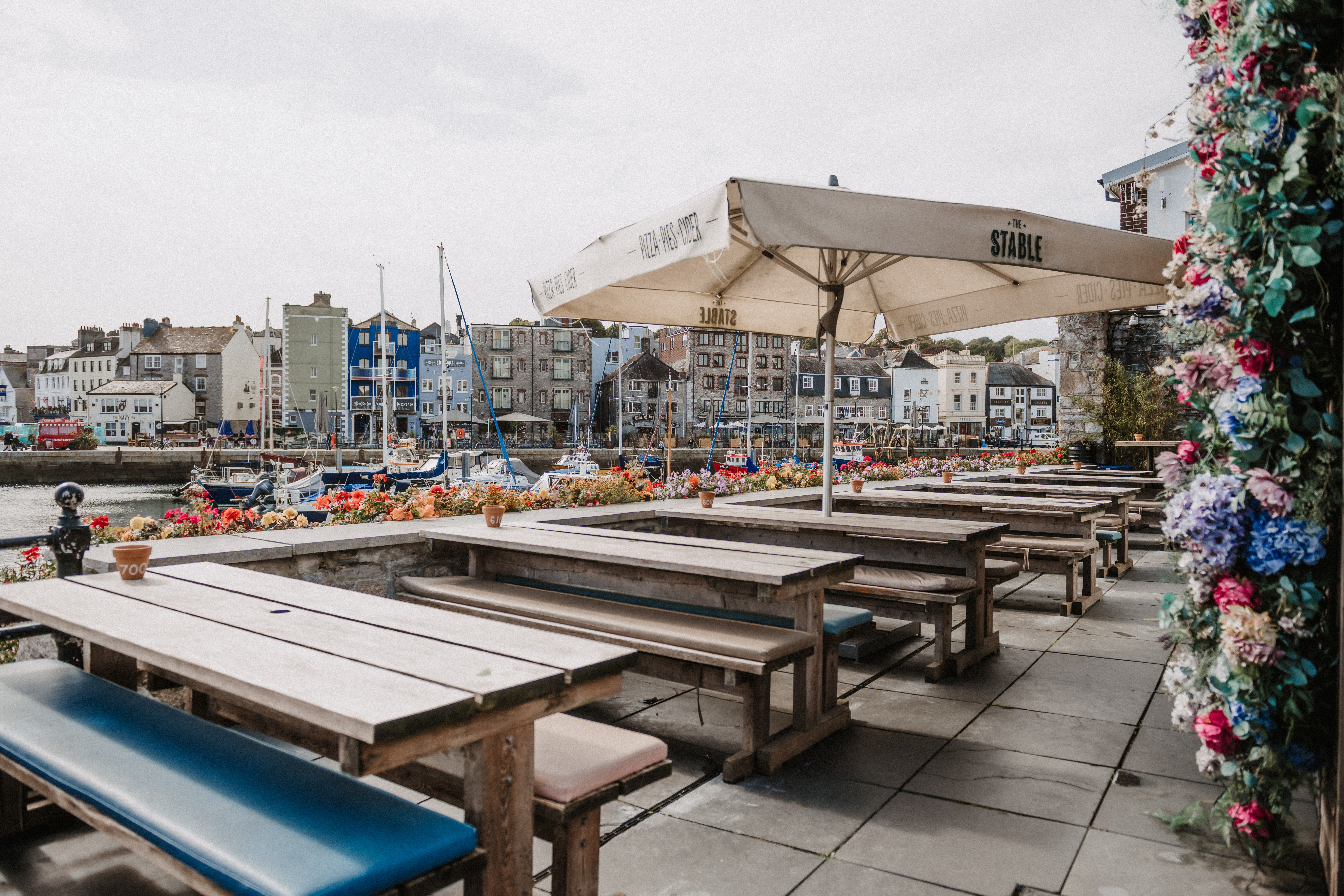 Harbour View Conservatory: charming outdoor venue with waterfront view for casual events.