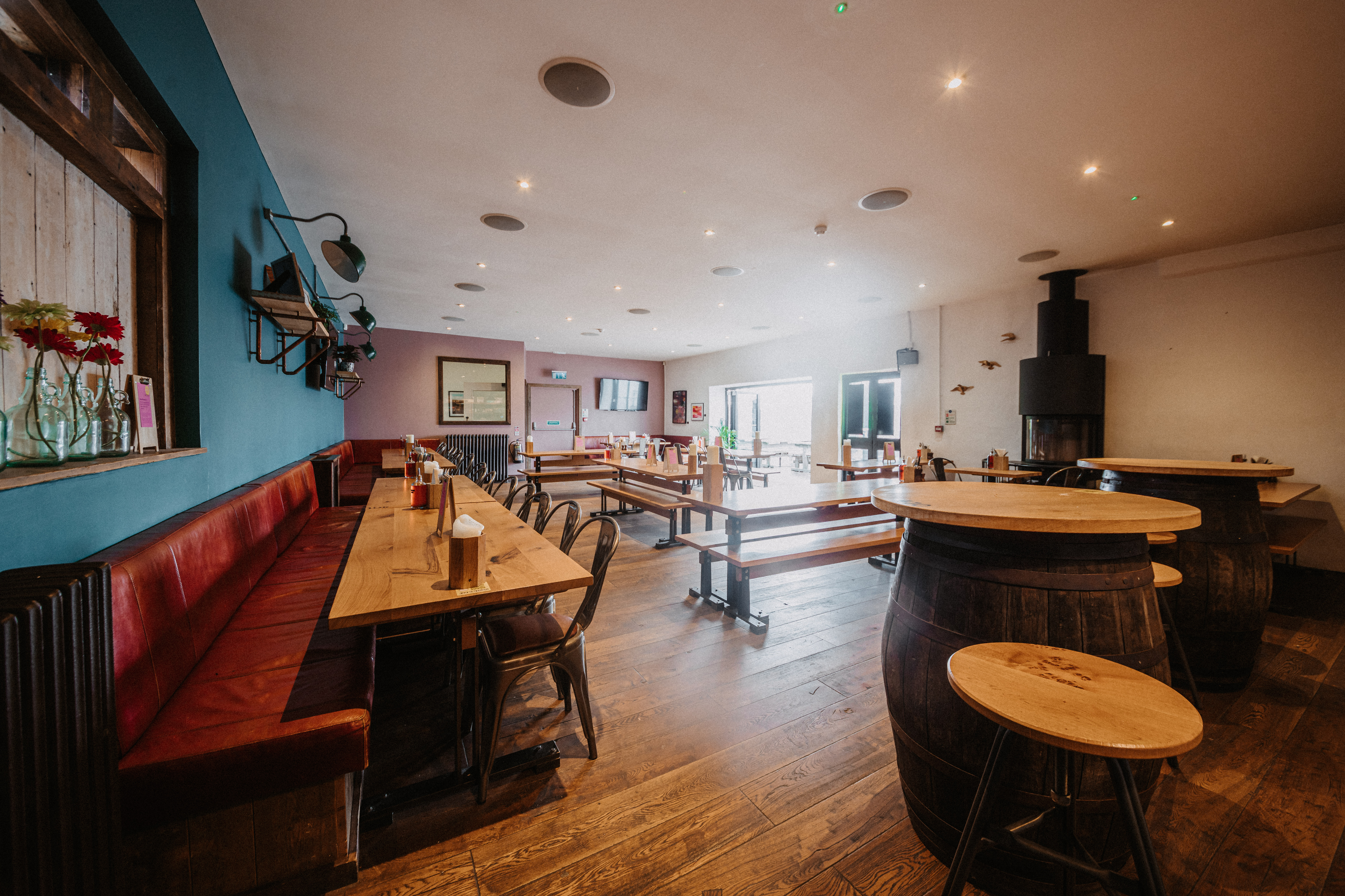 Top Deck event space with rustic decor, ideal for meetings and social gatherings.
