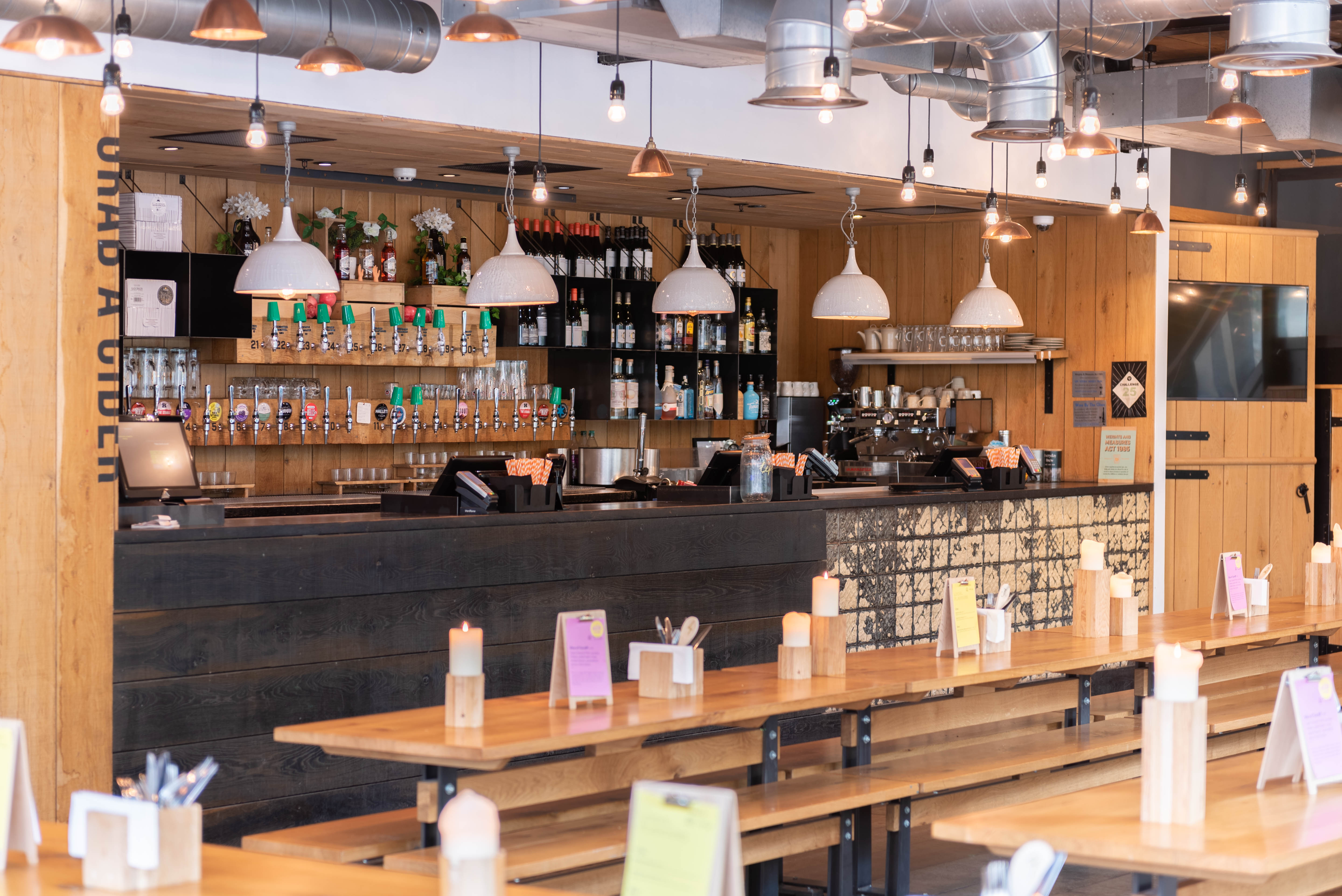 Modern venue hire in Cardiff with cozy lighting, perfect for networking events.