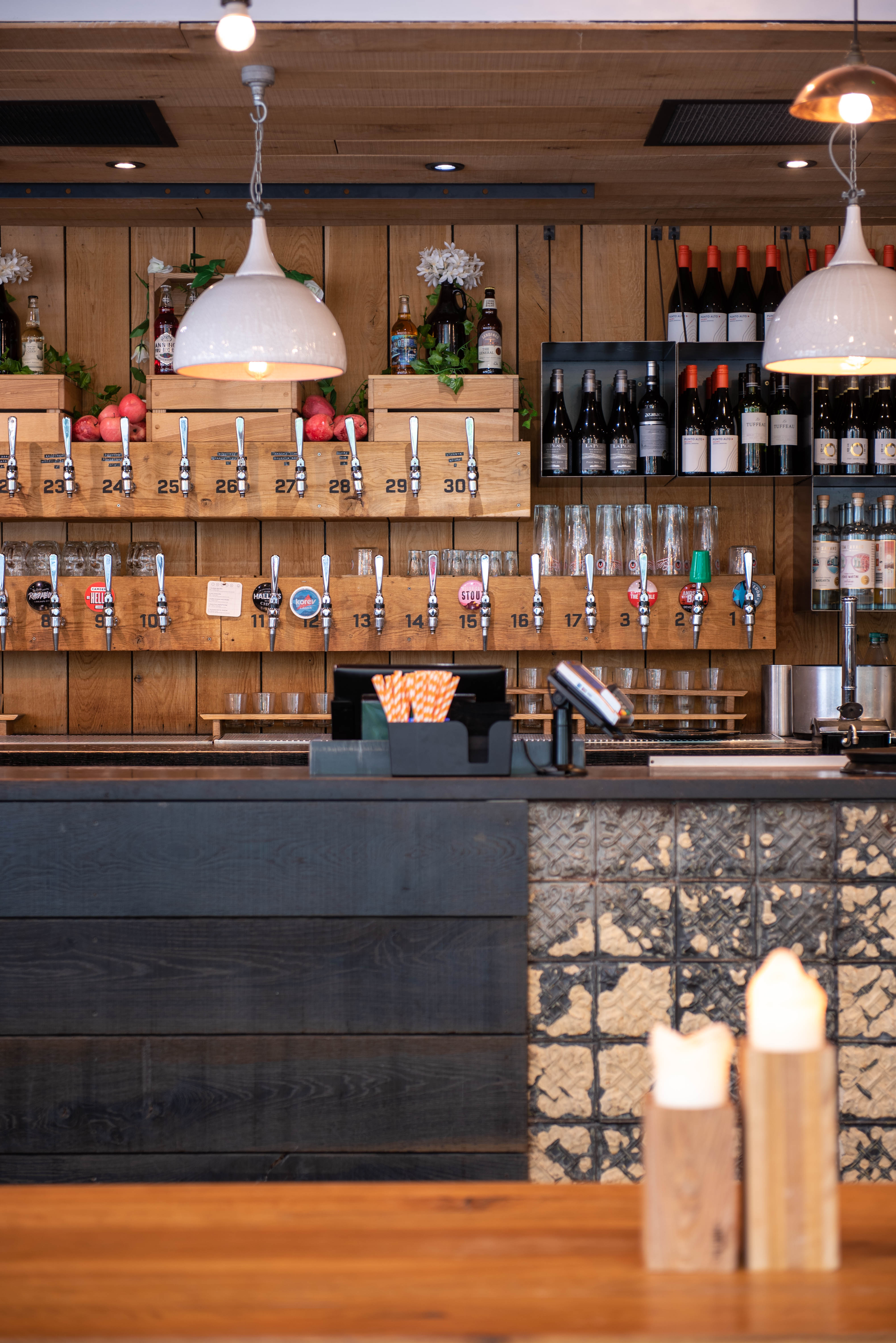 Full Venue Hire at The Cardiff Stable with inviting bar setup for events and gatherings.