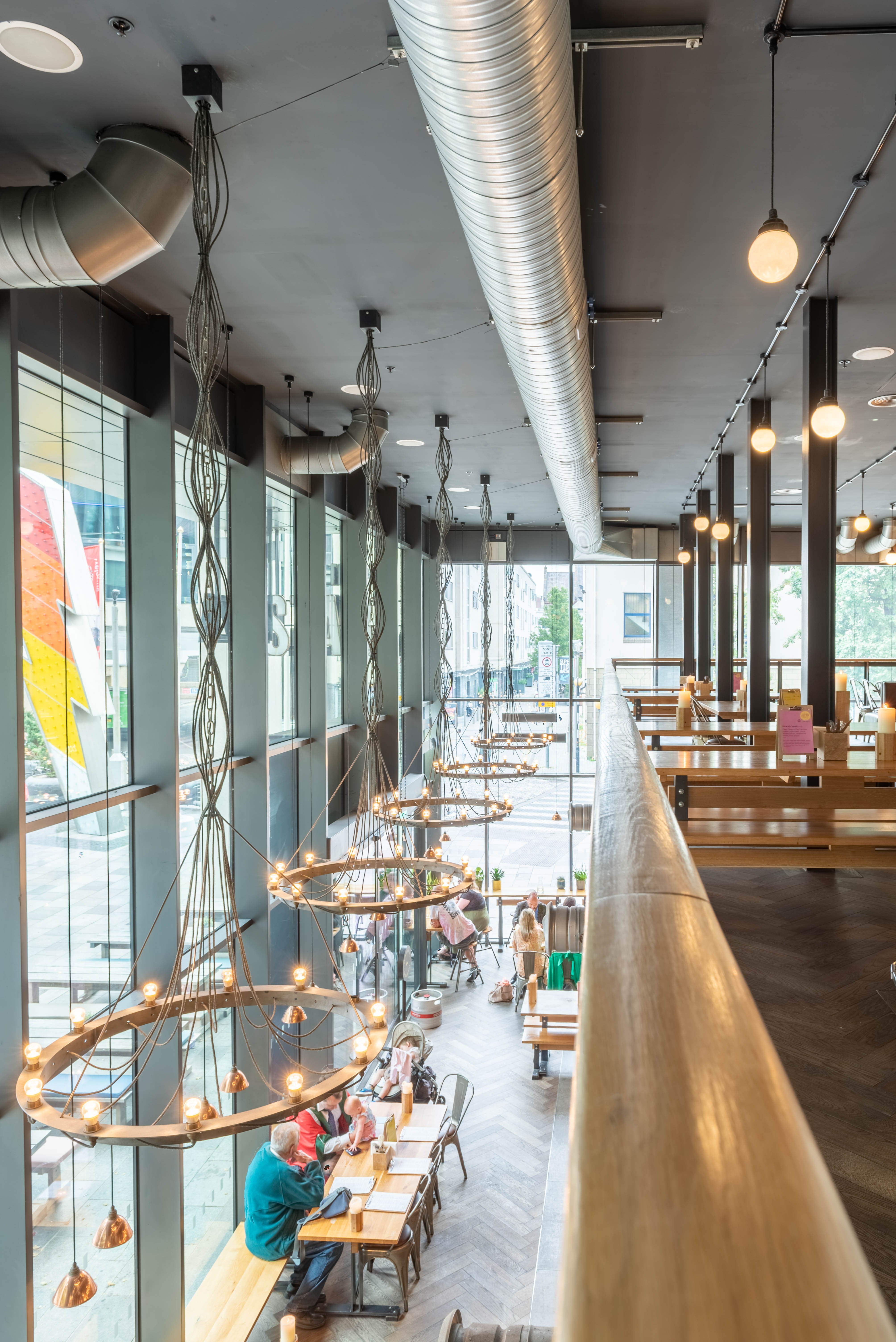 Modern event space with large windows at The Mezzanine, Cardiff Stable for meetings and events.