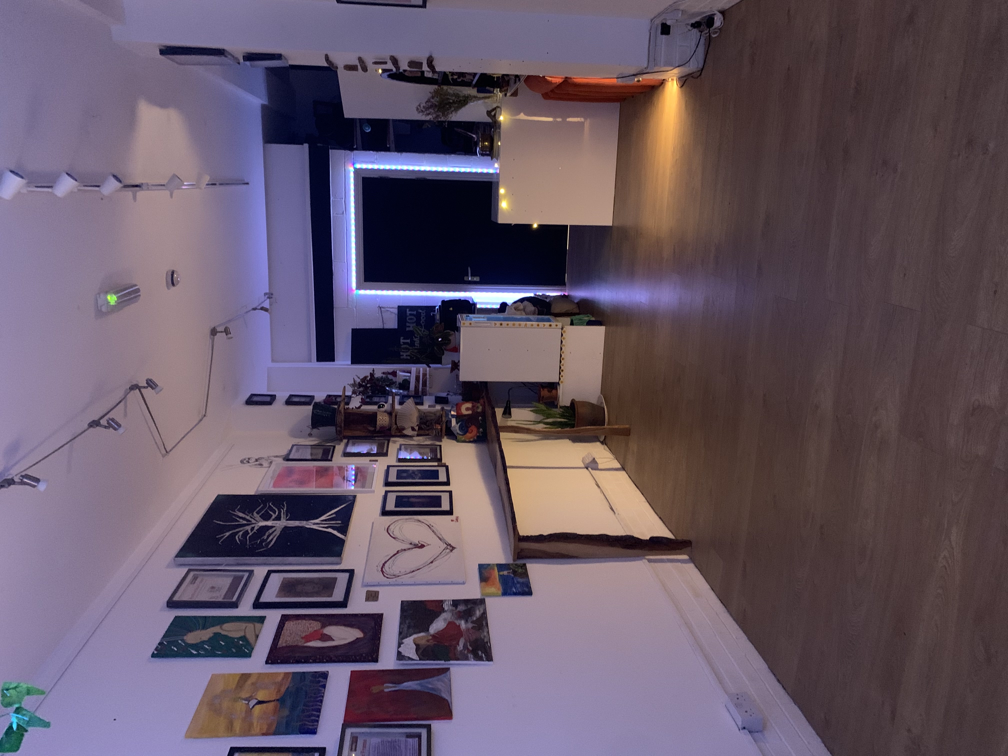 Creative event space with art and ambient lighting for networking and gatherings.