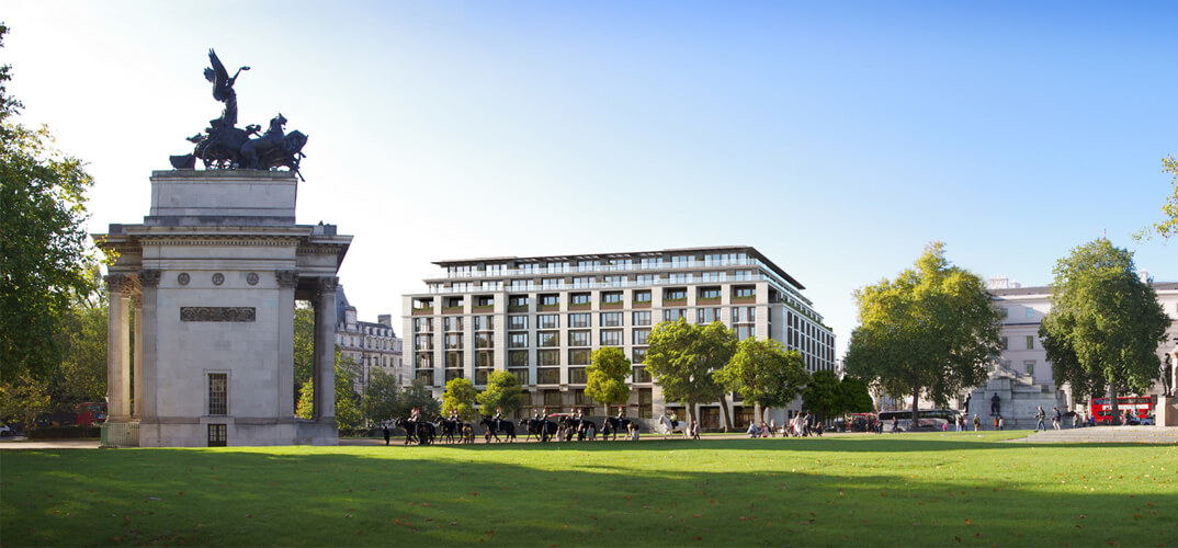 Modern hotel venue with lush greenery, ideal for upscale meetings and events.