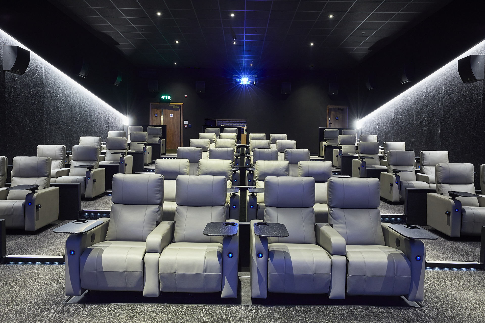 Modern cinema seating in ODEON LUXE & DINE Islington for film premieres and corporate events.