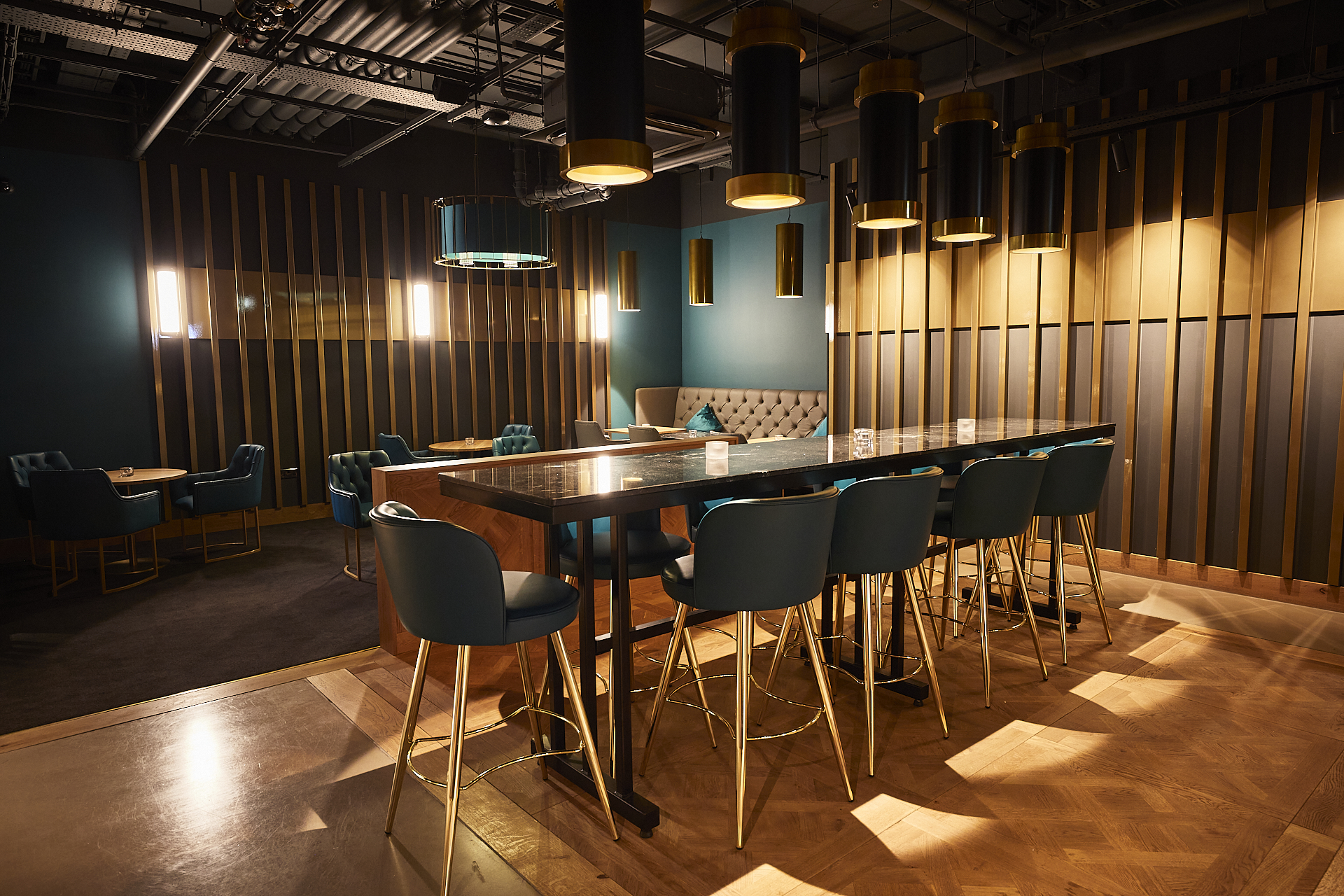 Modern event space with sleek bar, ideal for networking and meetings in Islington.