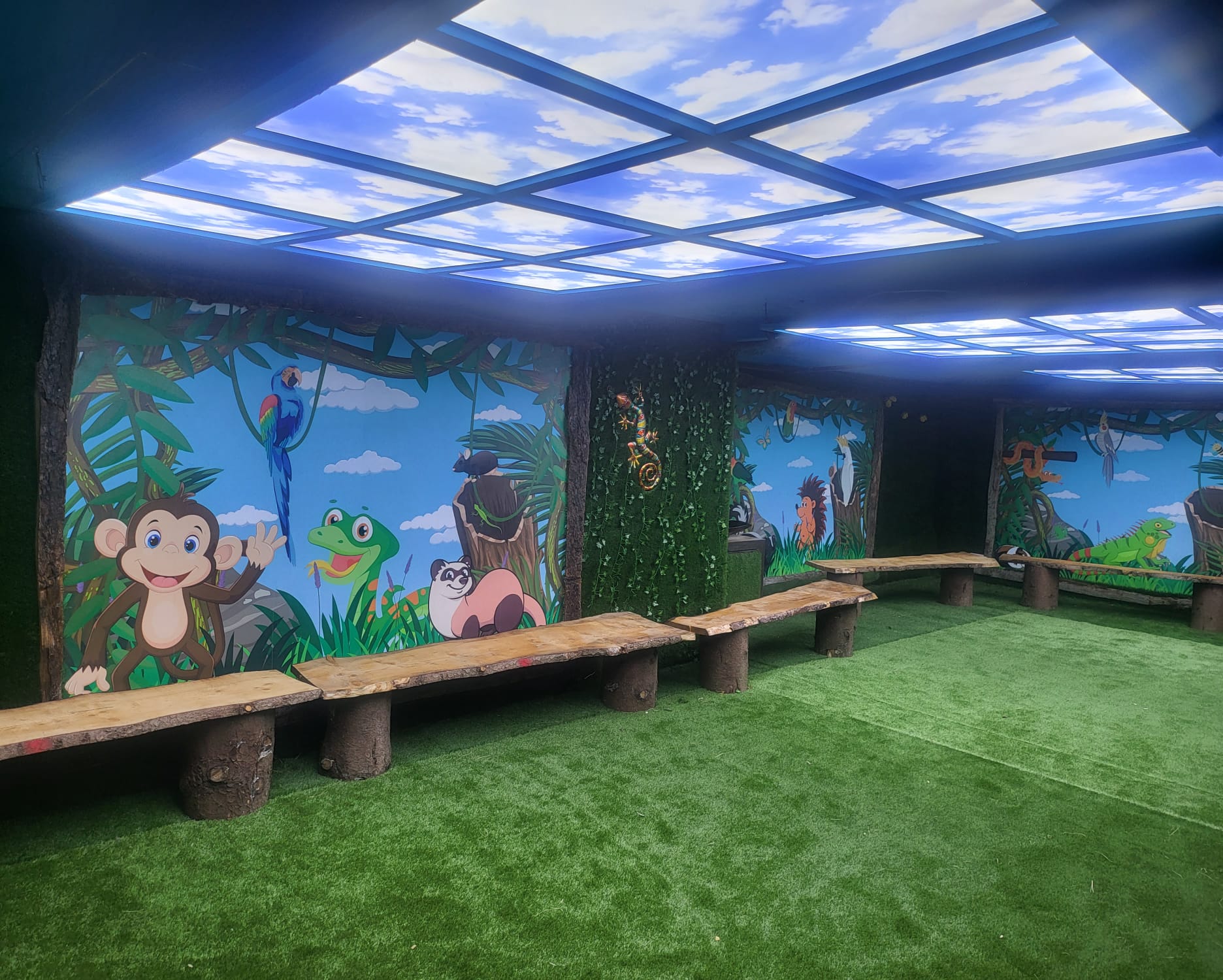 Vibrant jungle-themed meeting space for creative brainstorming and team-building events.