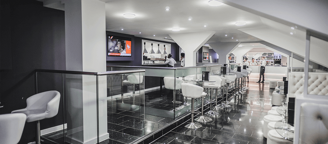 2010 Club at Selhurst Park: modern event space with stylish bar for receptions and gatherings.