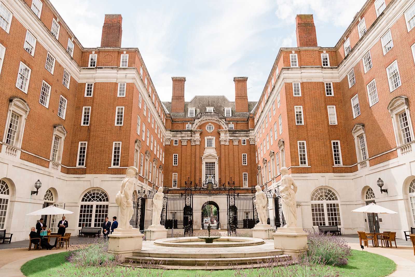 Stunning wedding venue at BMA House with elegant architecture and central fountain.