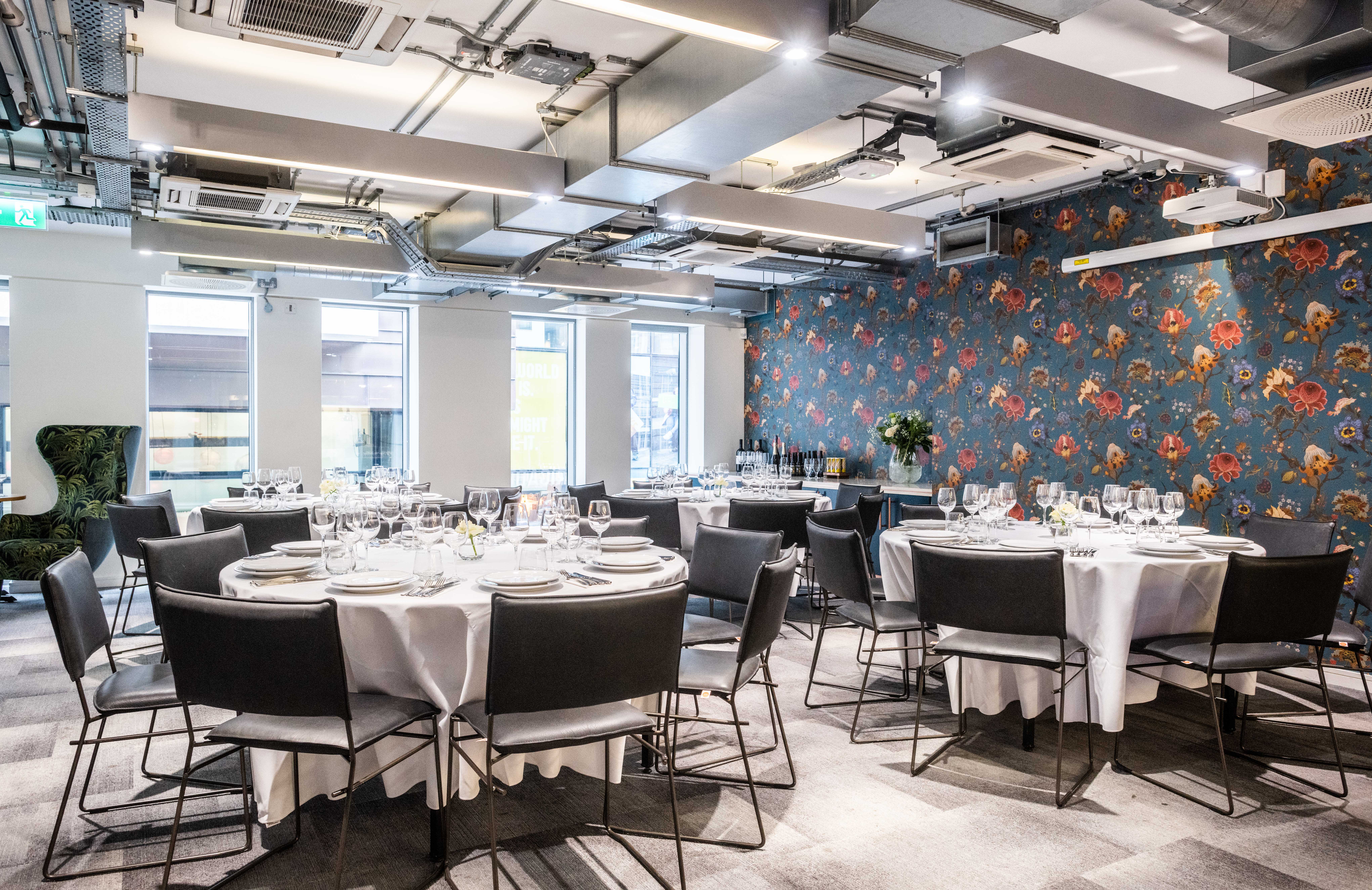 Covent Garden event space with elegant tables, perfect for corporate meetings and private dinners.