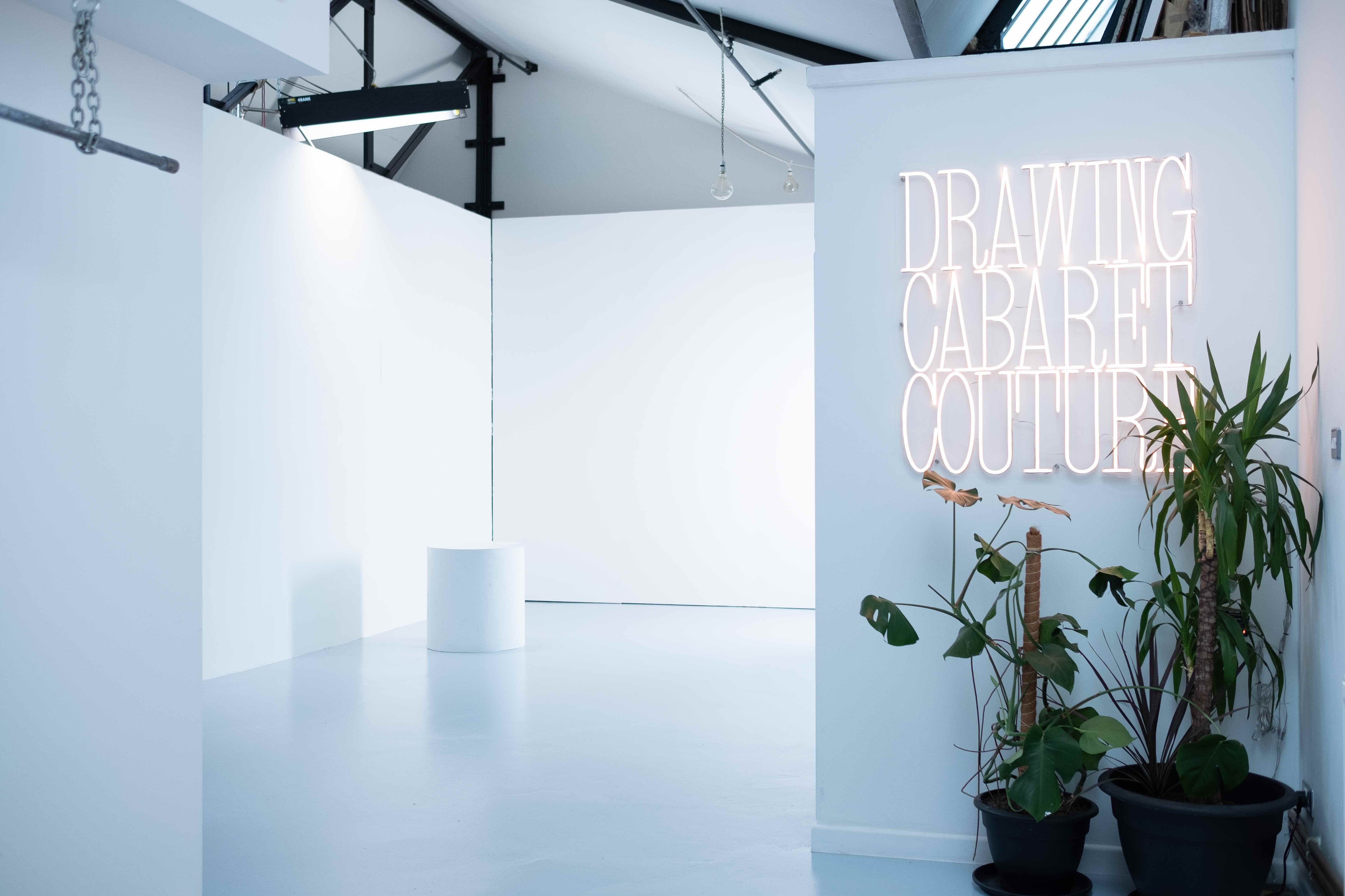 Sleek minimalist event space in DCC Studio Hackney Wick, perfect for art exhibitions and fashion shows.