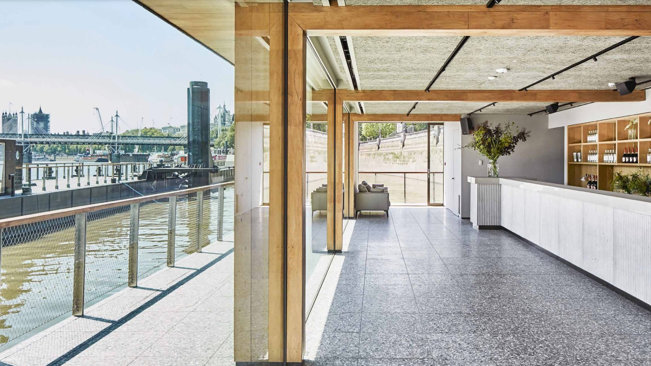 Modern event space at Woods Quay with waterfront views, perfect for corporate meetings.