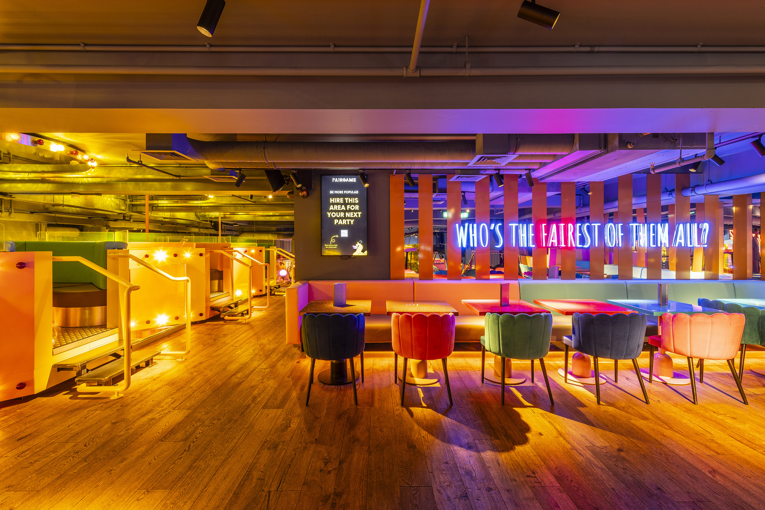 Vibrant event space with colorful seating for networking and casual gatherings.