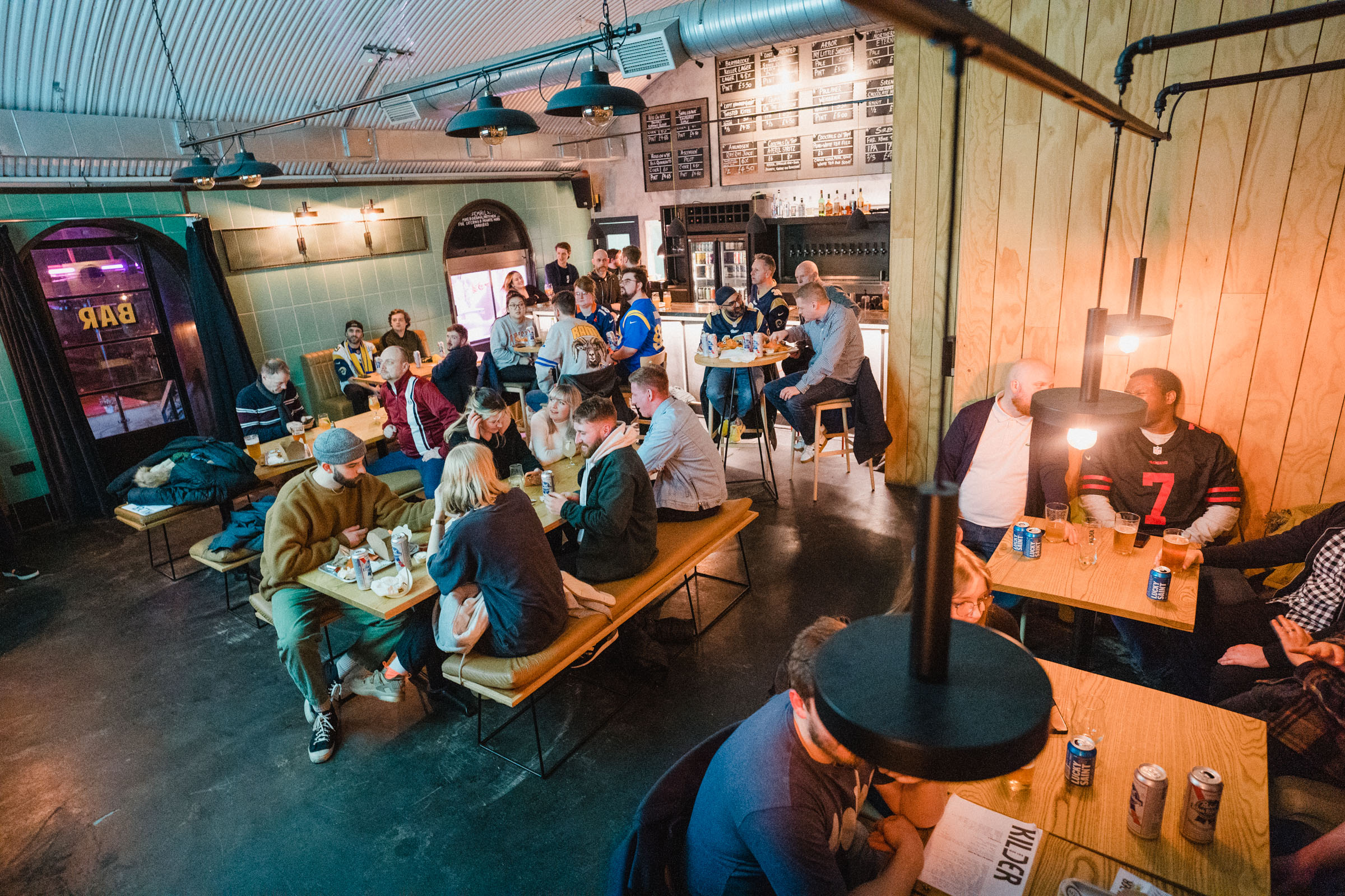 Vibrant Kilder bar with communal seating, ideal for networking and casual gatherings.