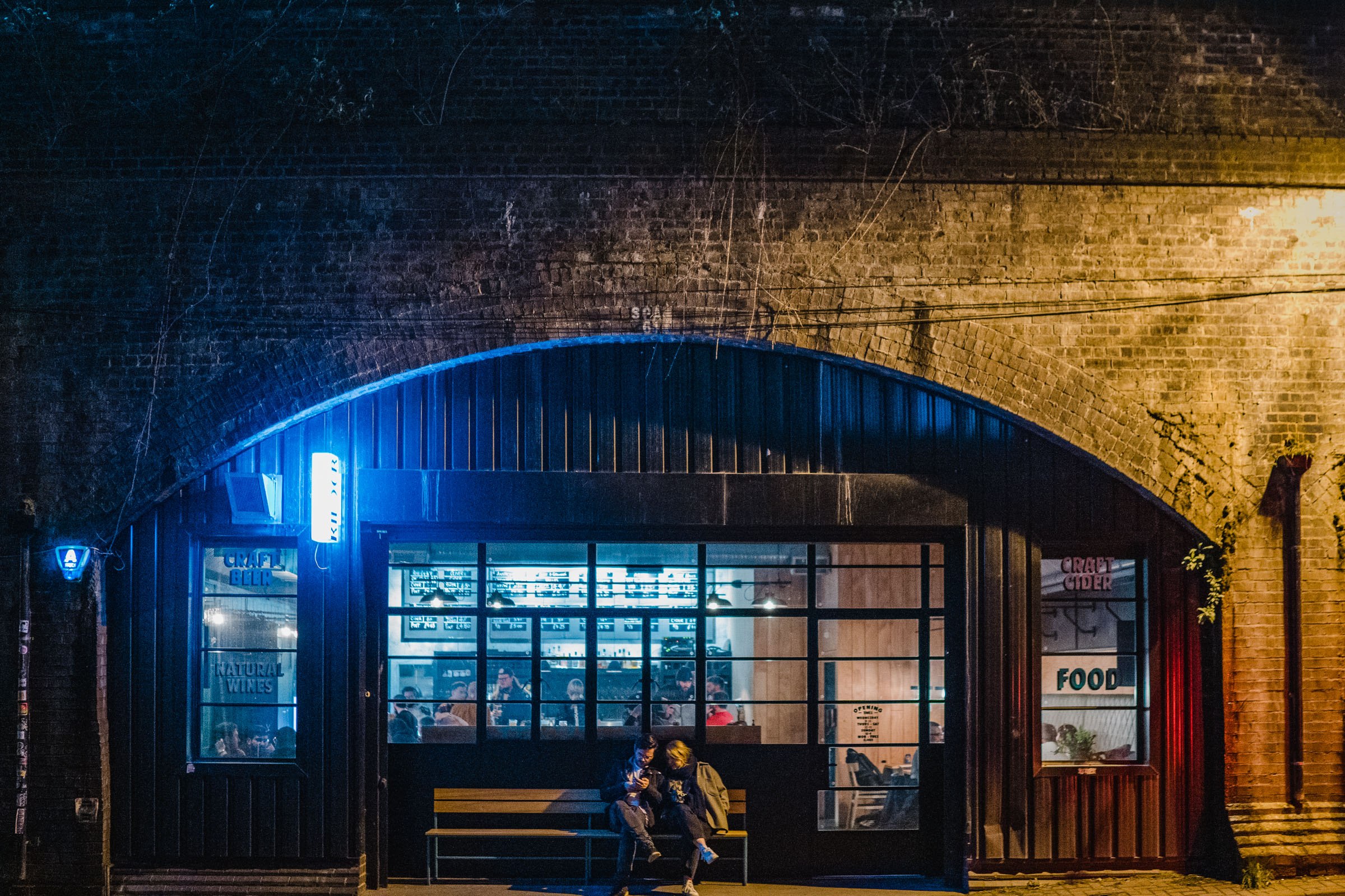 Cozy Kilder bar with warm lighting, perfect for networking events and social gatherings.