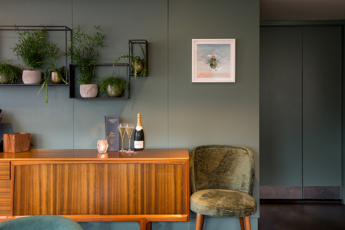 Private dining room at Barbican Brasserie, elegant decor for upscale events and gatherings.