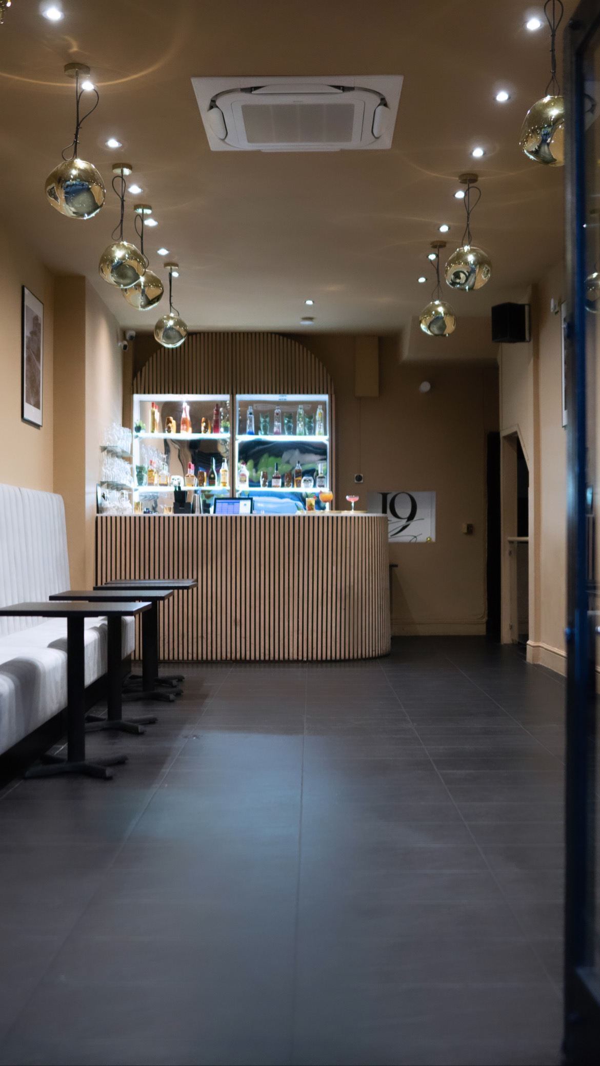 Sleek bar area in Main Lounge, perfect for cocktail receptions and networking events.