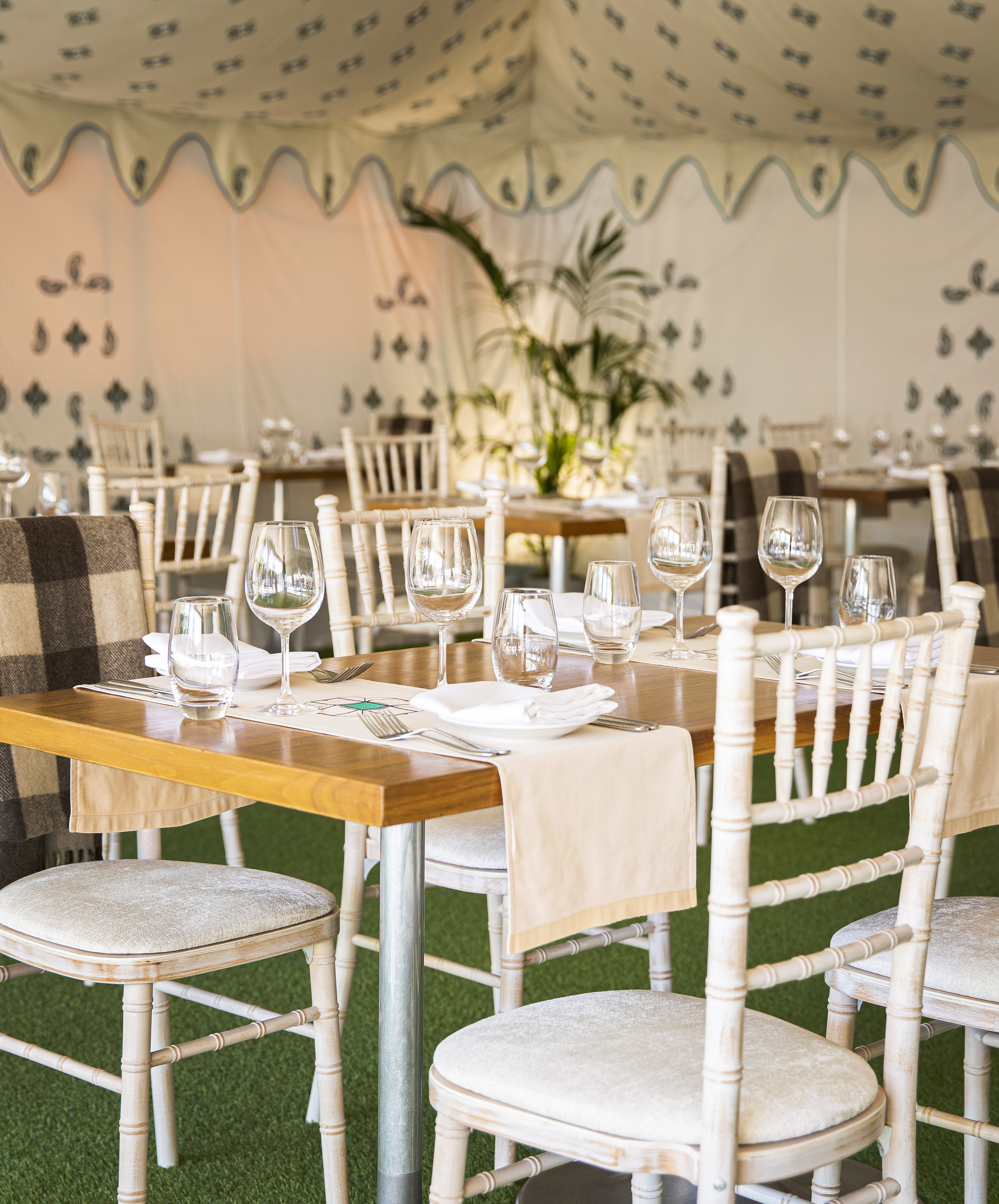 Elegant dining setup at Babur's Marquee for upscale corporate events and celebrations.