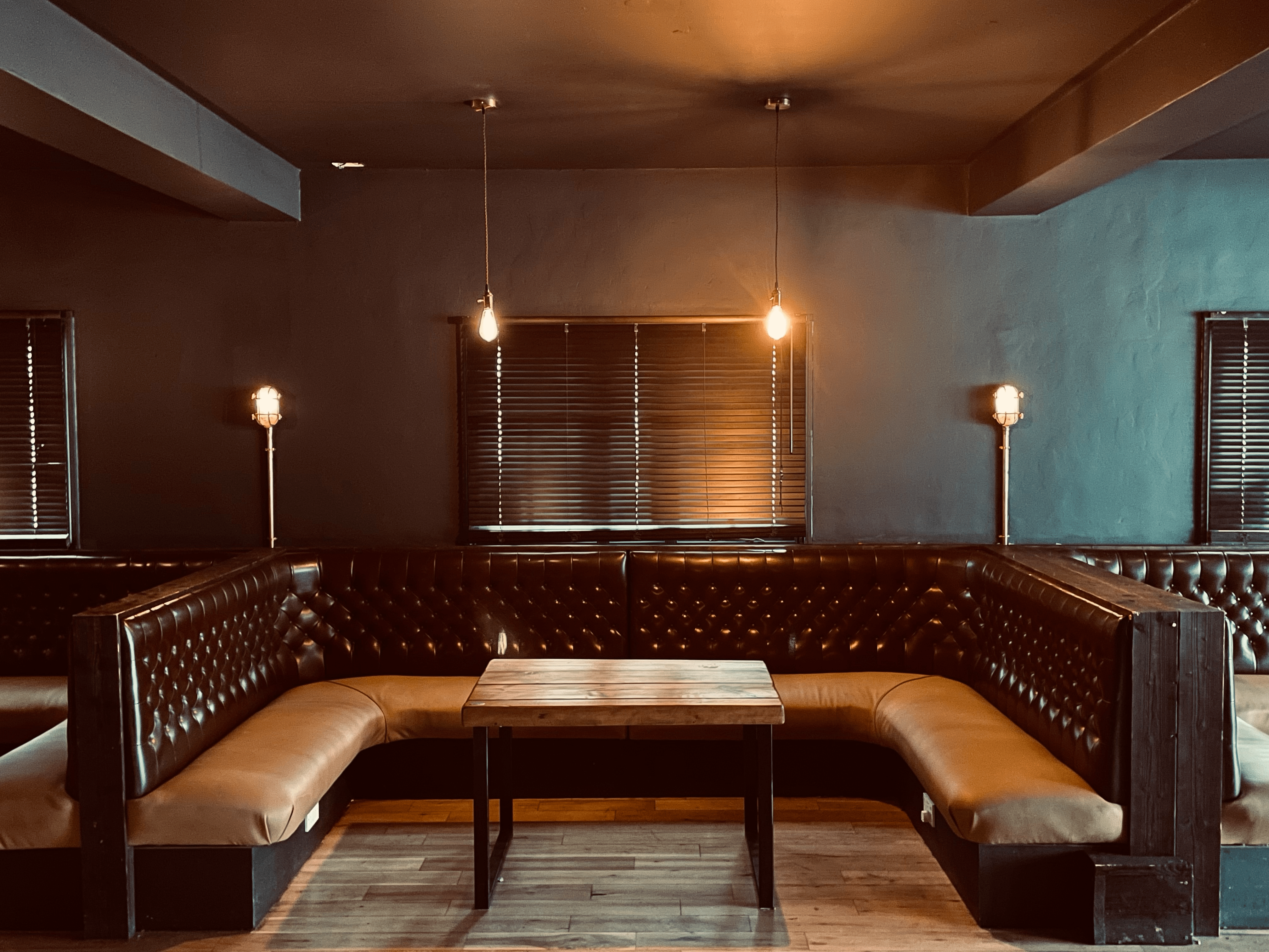 Cozy leather seating area in South West Eleven for intimate meetings and networking events.