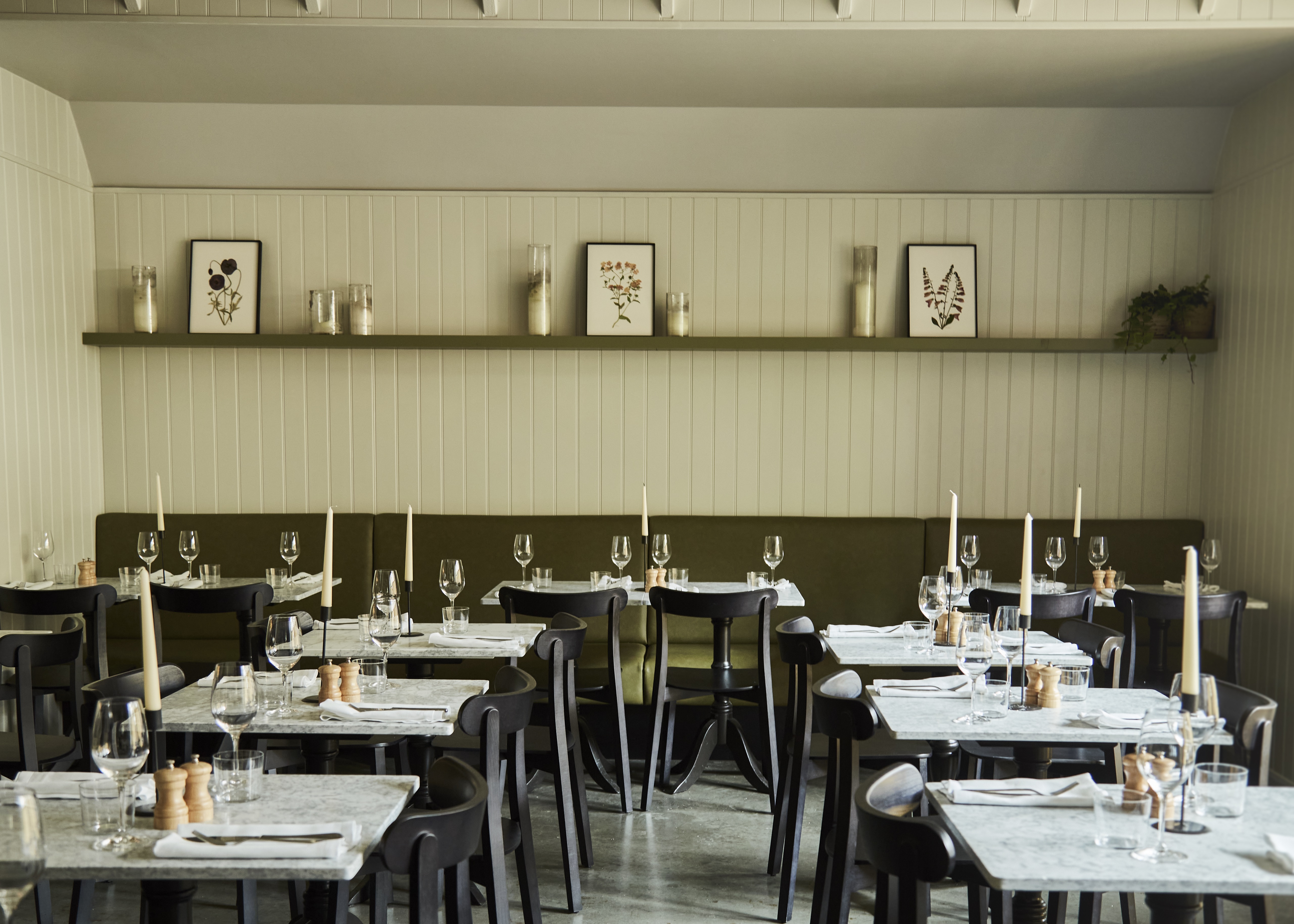 Stylish Archway Battersea restaurant with candlelit tables for events and gatherings.