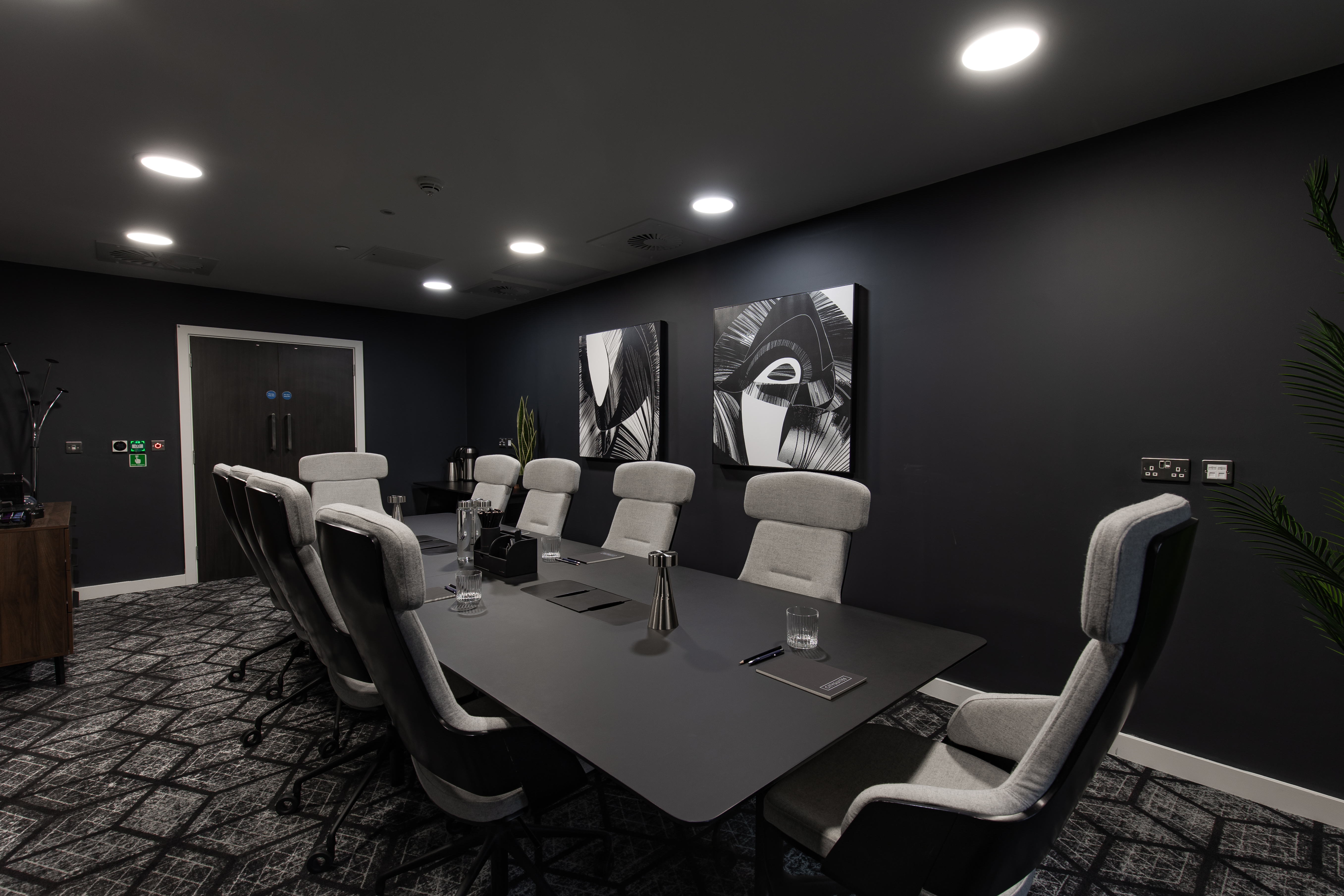Modern conference room with ergonomic chairs for productive meetings at CitySuites II.