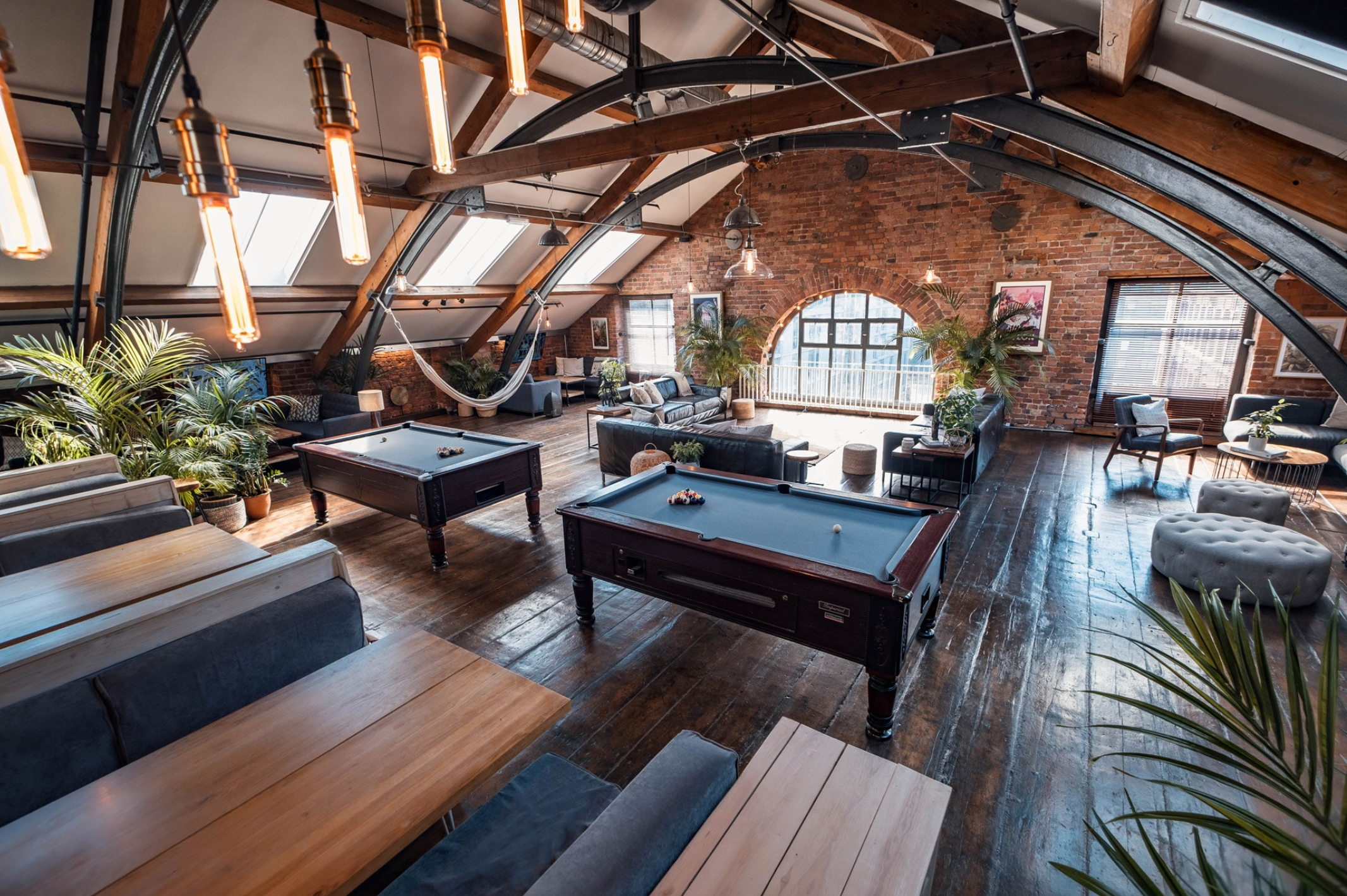Stylish Beehive Mill event space with natural light, ideal for meetings and gatherings.