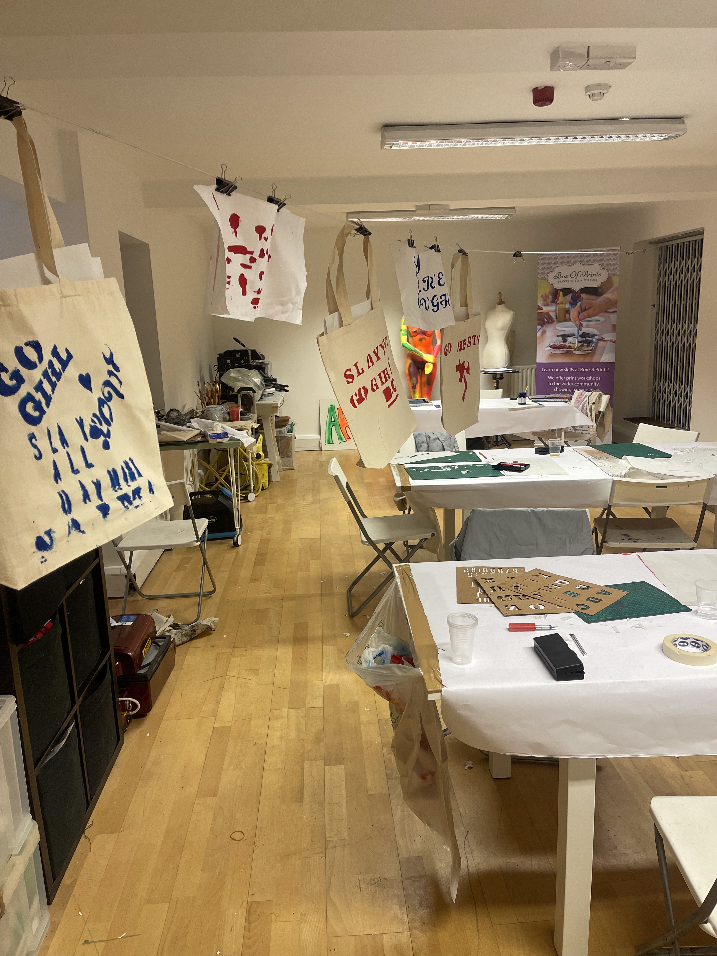 Creative workshop setup at Th Bop Hub with crafting materials for team-building events.