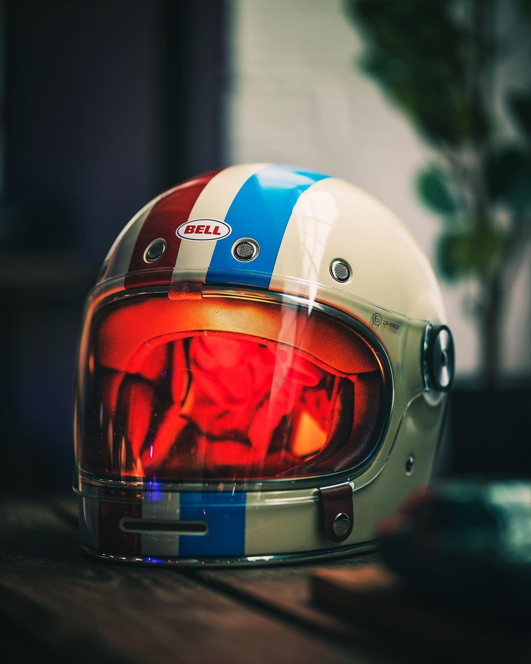 Vintage racing helmet centerpiece for automotive-themed events, inspiring decor and branding.