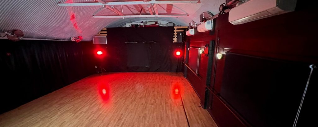 Versatile LA Studio in London with polished wooden floor for events and performances.