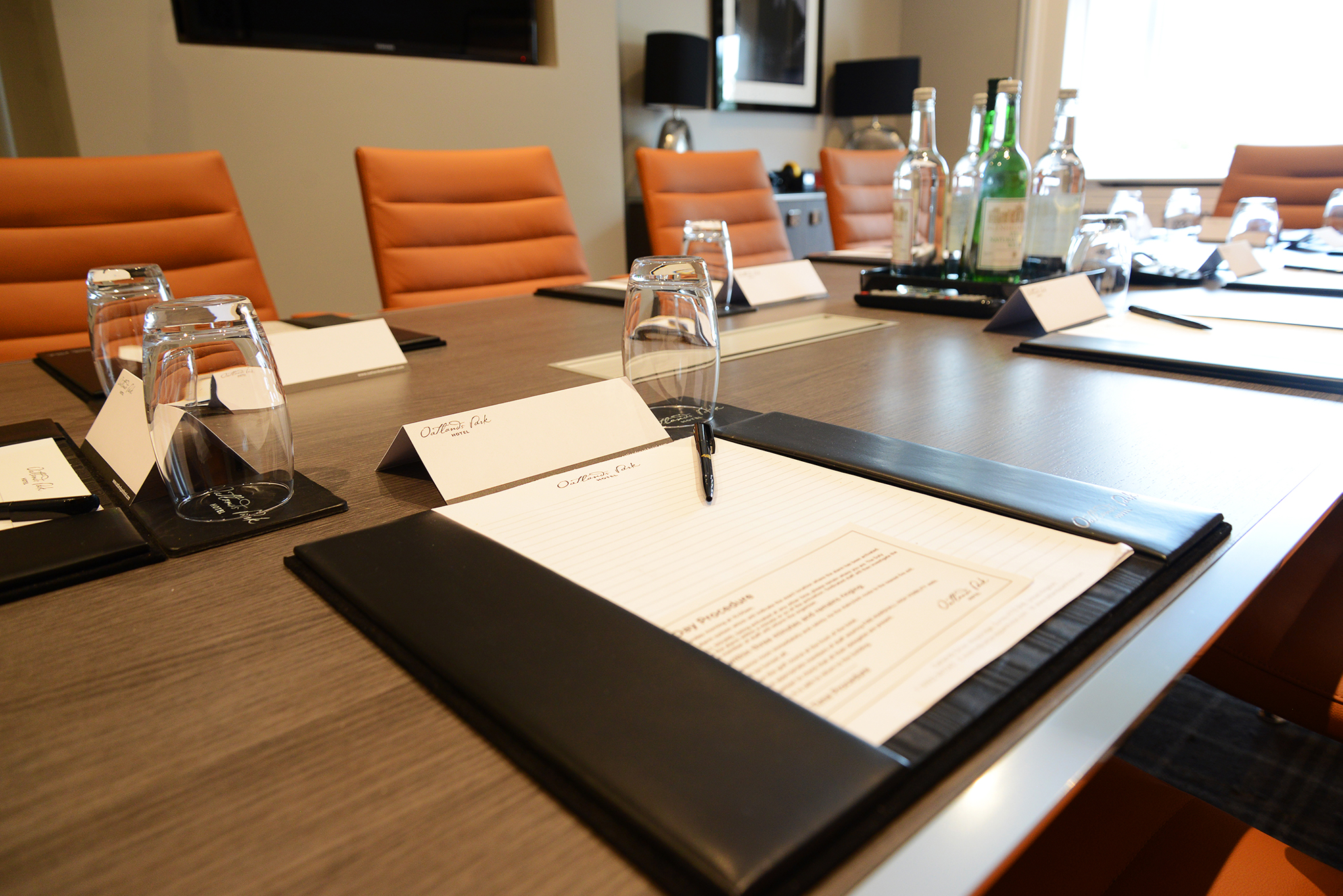 Parr Room at Oatlands Park Hotel, polished table set for corporate meetings and workshops.
